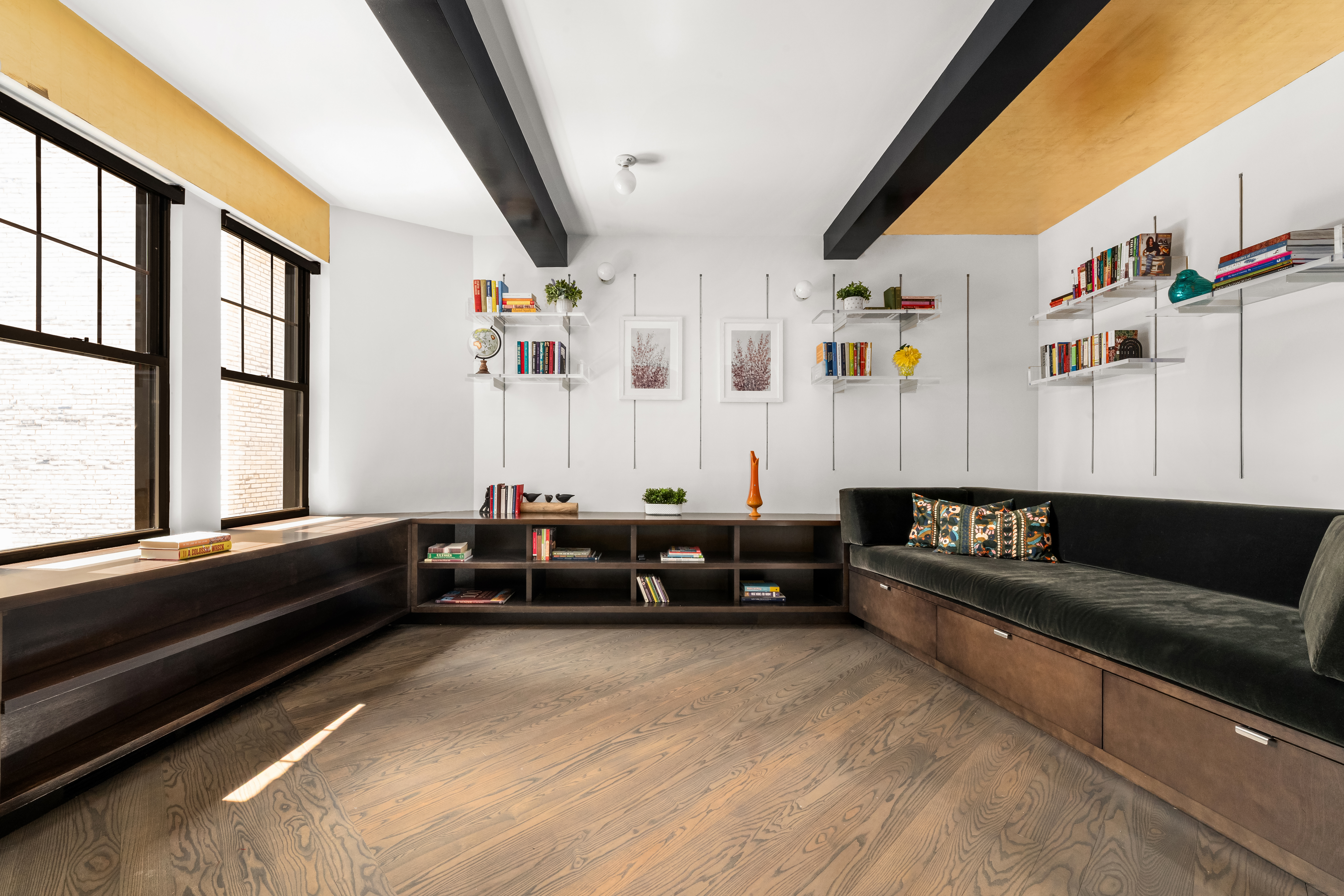 170 2nd Avenue, Unit 5A Manhattan, NY 10003 - Photo 8 of 12 a living room with furniture and large window