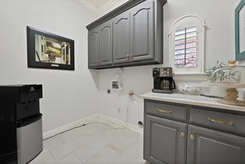 a kitchen with stainless steel appliances granite countertop a refrigerator and sink