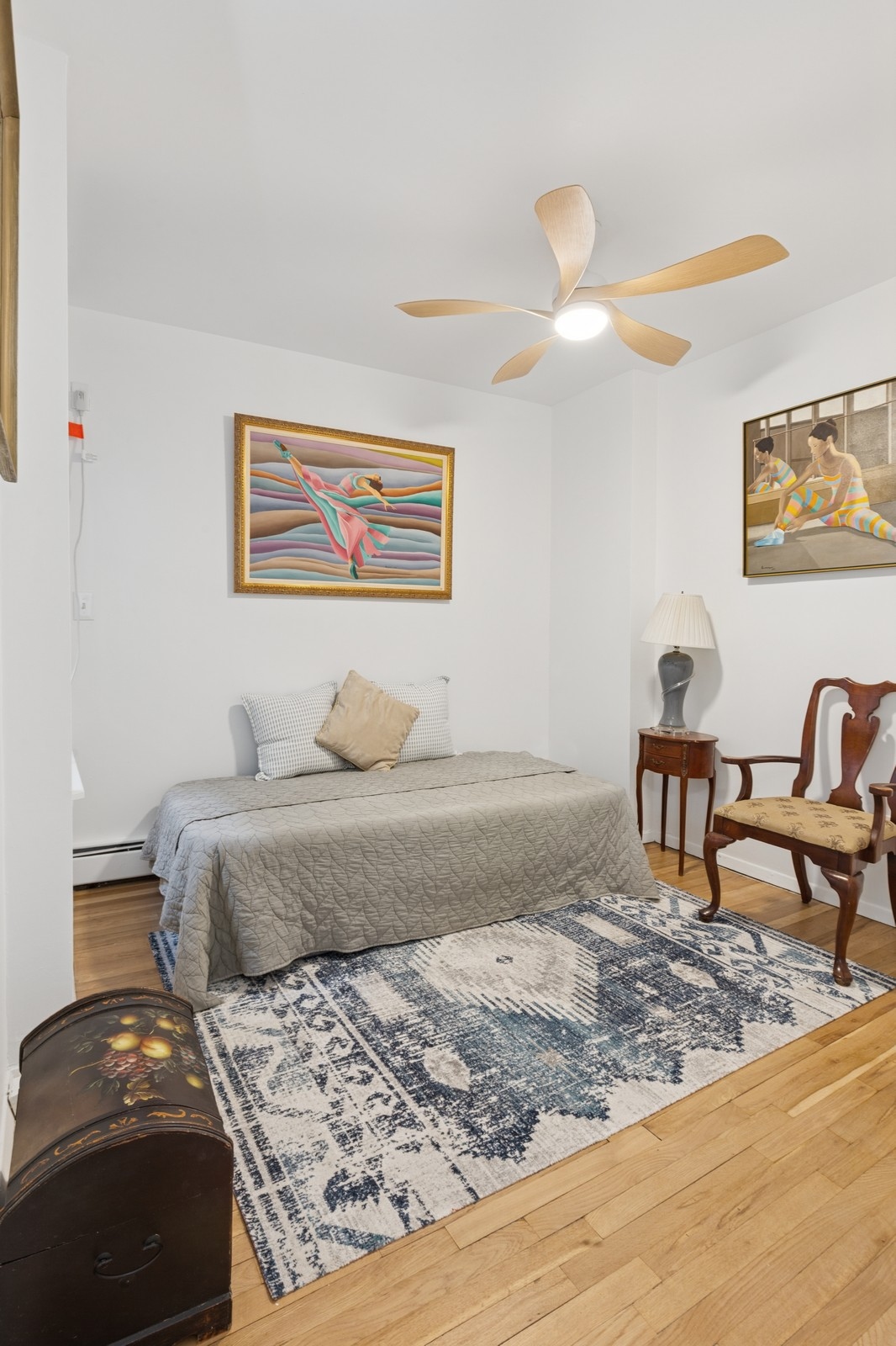 5 West 107th Street, Unit 4D Manhattan, NY 10025 - Photo 4 of 8 a bedroom with a bed and a dresser