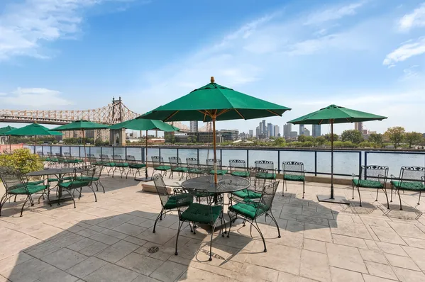 a view of a chairs and table in the terrace