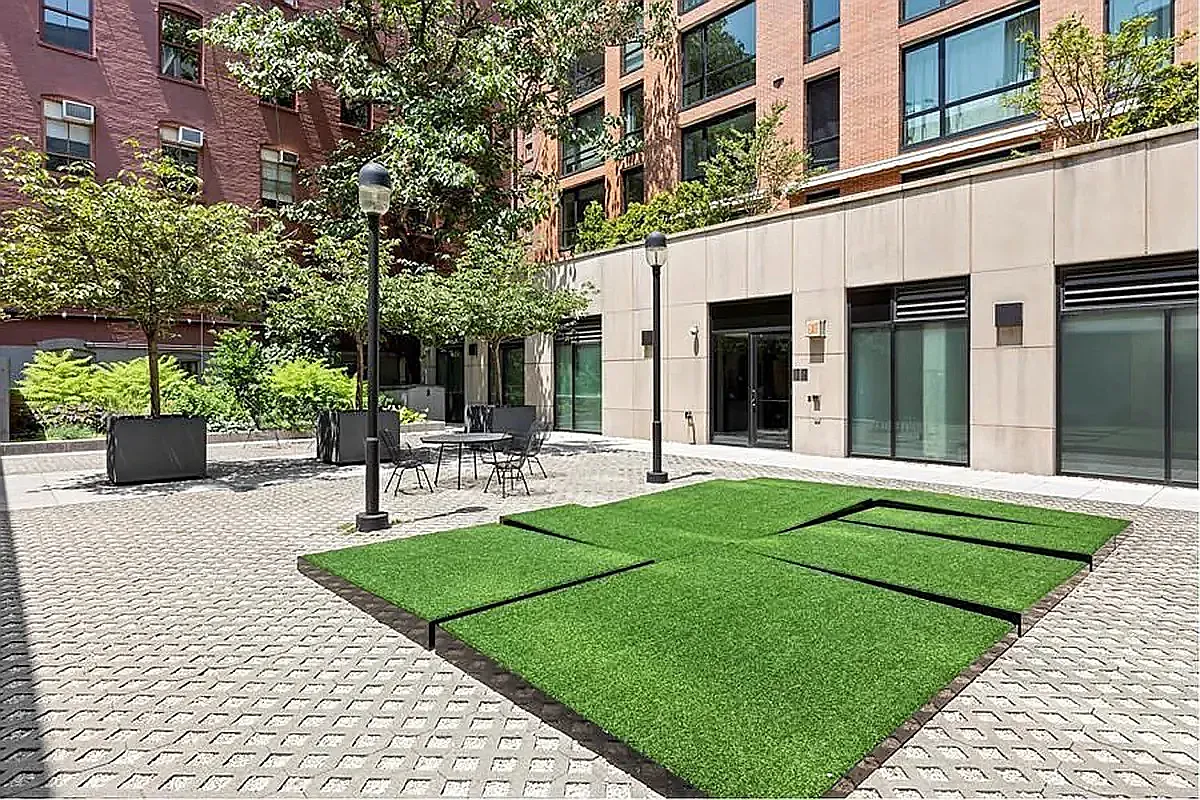540 West 28th Street, Unit 8A Manhattan, NY 10001 - Photo 9 of 12 a view of a house with sitting area and garden