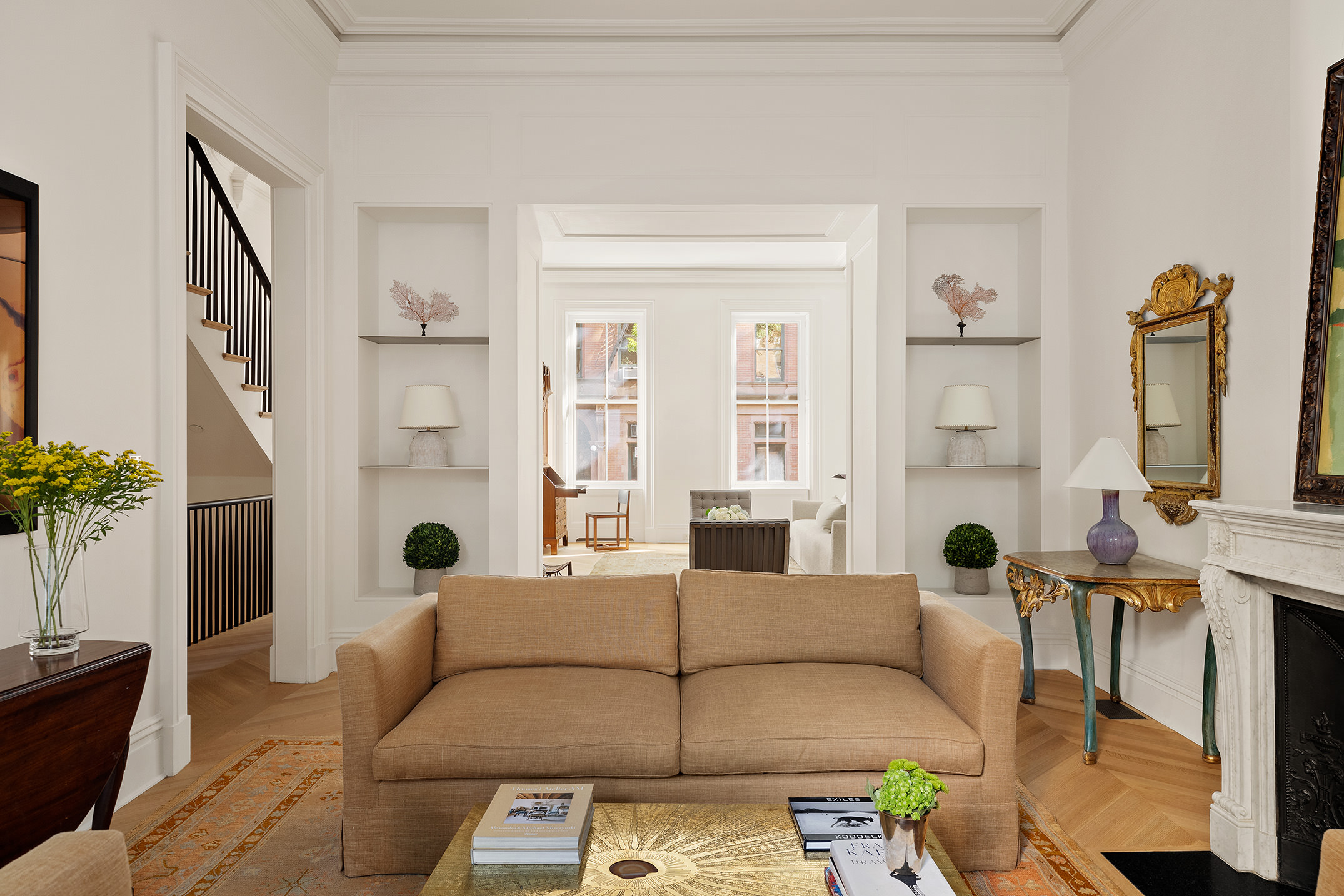 55 West 9th Street Manhattan, NY 10011 - Photo 5 of 20 a living room with furniture and a large window