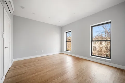 a bathroom with a toilet a sink and bathtub