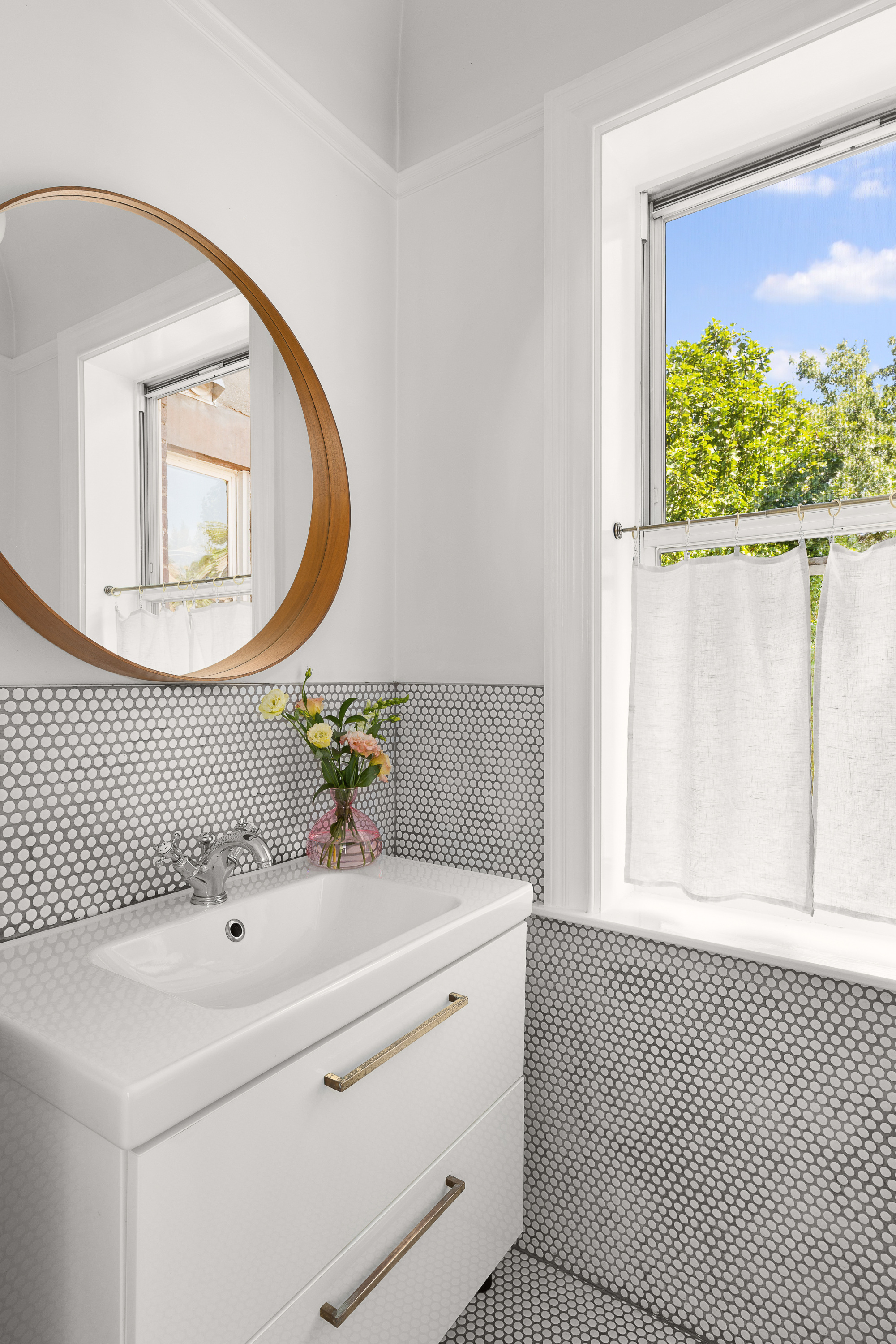 214 Carlton Avenue, Unit 2 Brooklyn, NY 11205 - Photo 10 of 16 a bathroom with a sink and a mirror