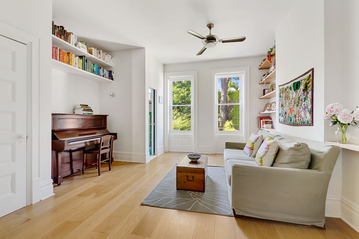 856 St Johns Place Brooklyn, NY 11216 - Photo 3 of 14 a living room with furniture and a piano
