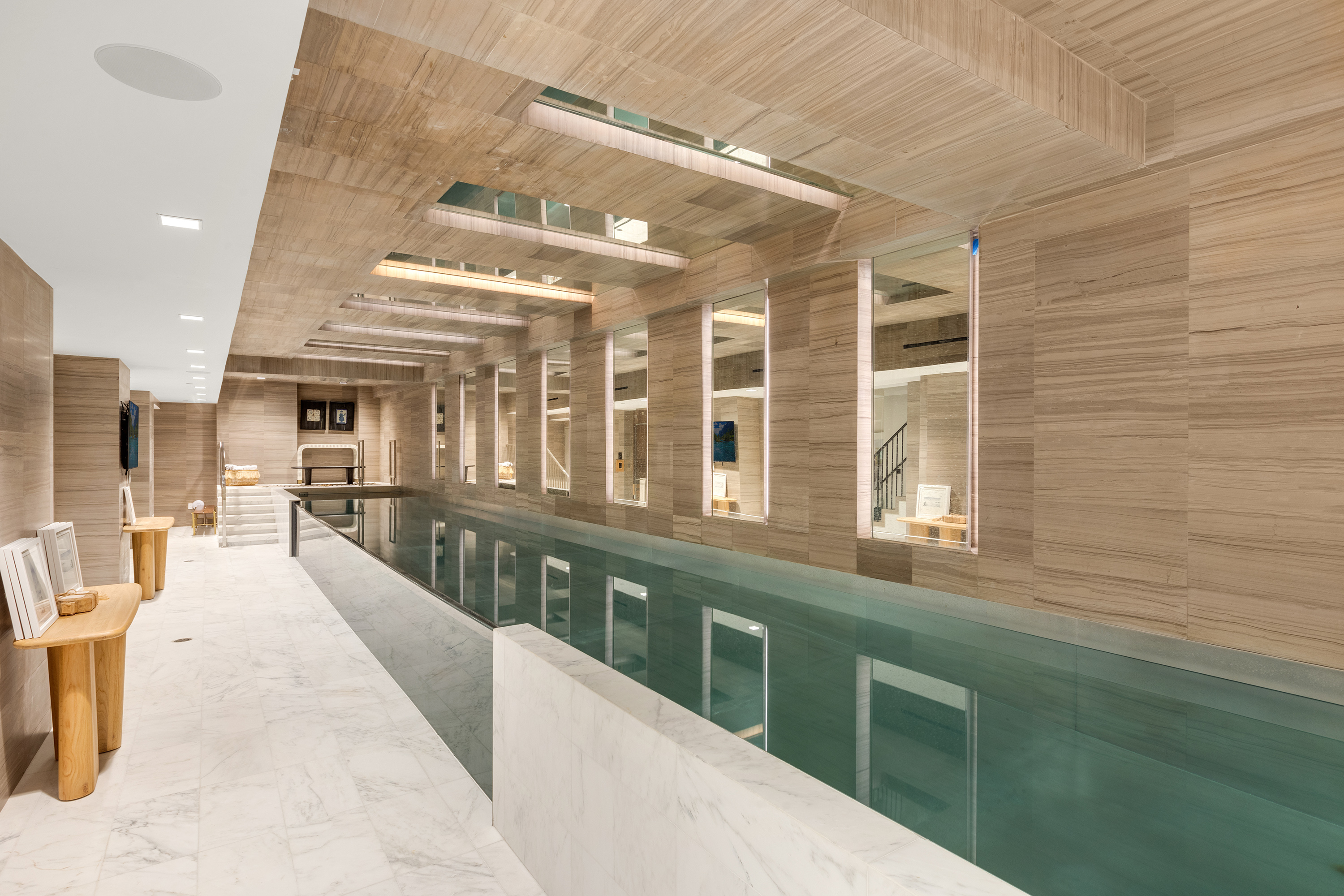 11 Beach Street, Unit THA Manhattan, NY 10013 - Photo 23 of 29 a large white kitchen with kitchen island a large window a sink and a counter space