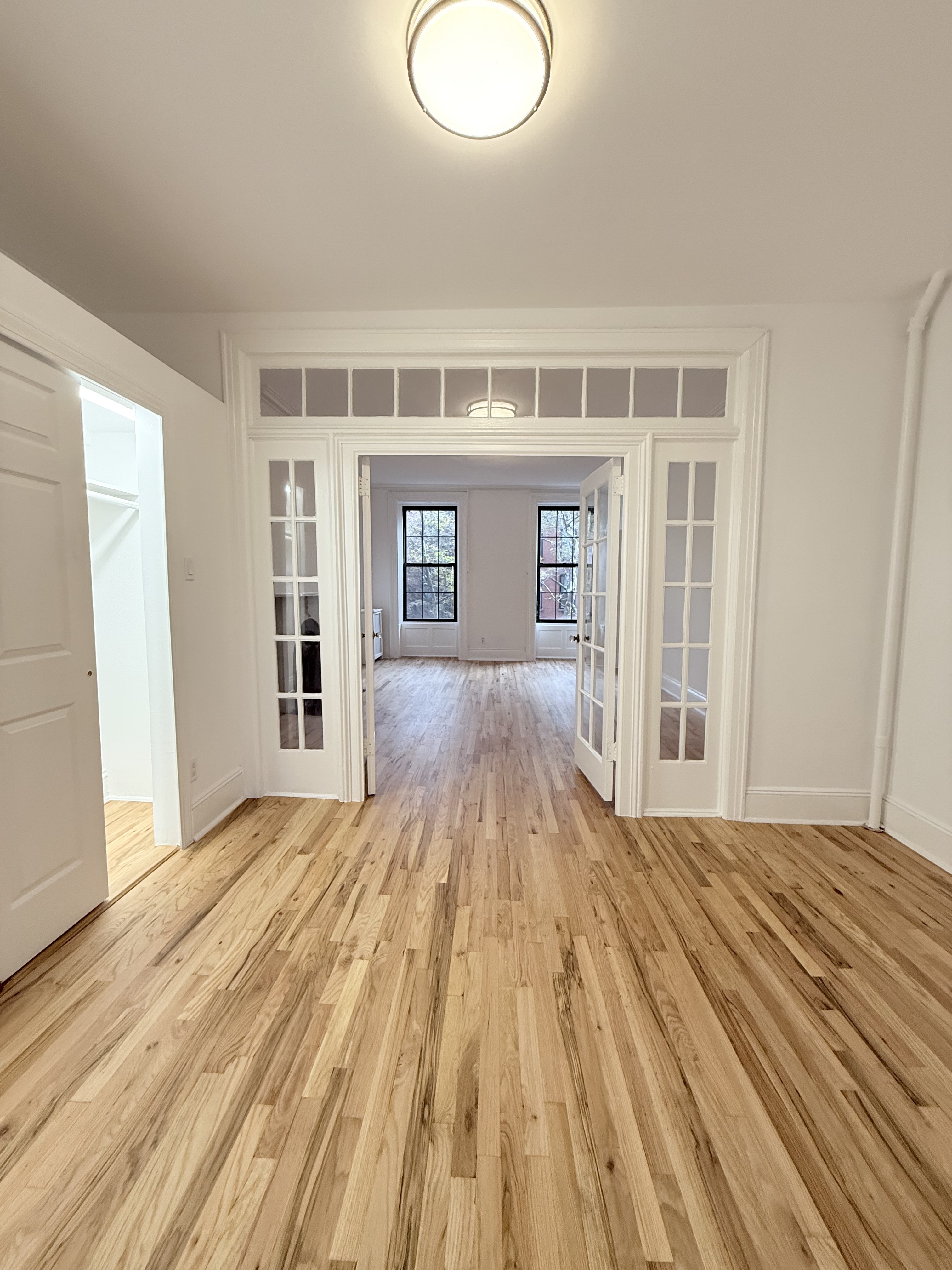 141 Summit Street, Unit 3 Brooklyn, NY 11231 - Photo 11 of 17 a bedroom with a bed and a window