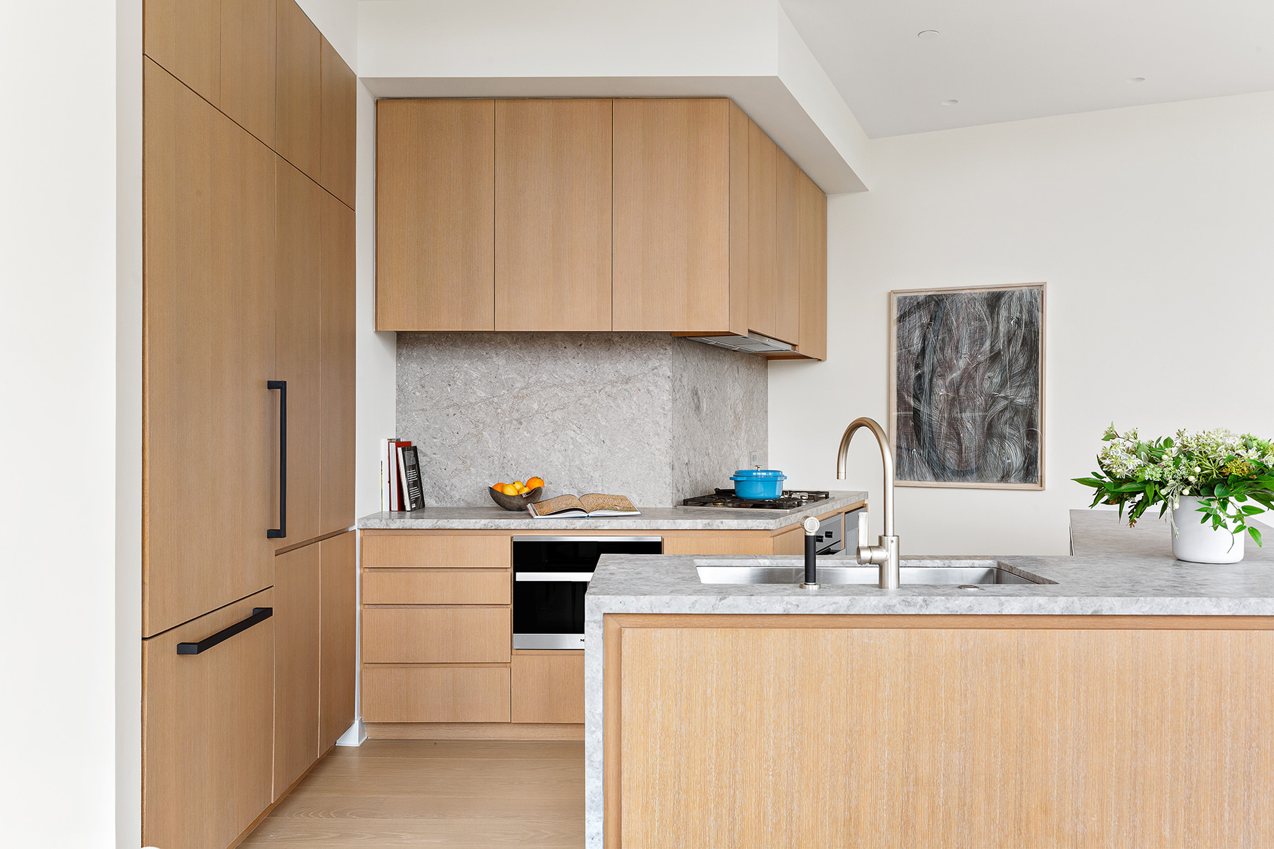 33 Park Row, Unit 17B Manhattan, NY 10038 - Photo 7 of 22 a kitchen with stainless steel appliances granite countertop a sink stove and cabinets