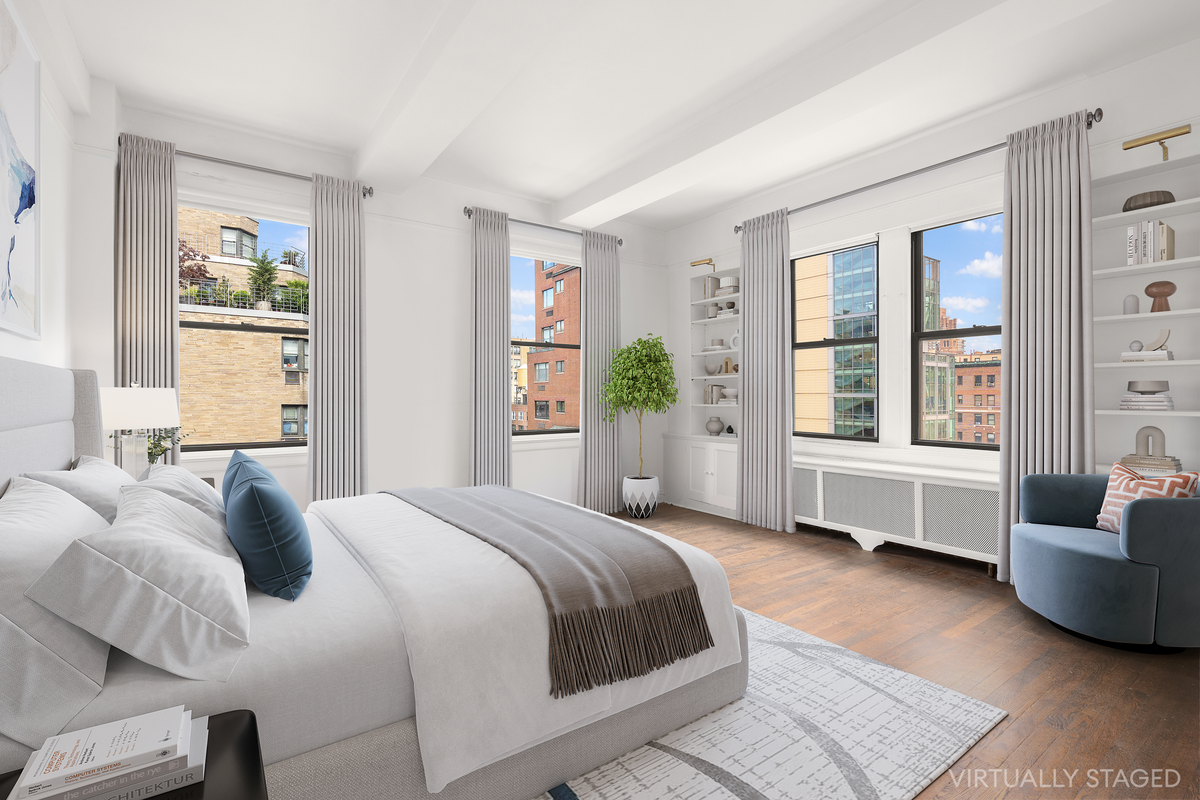 140 East 81st Street, Unit 12B Manhattan, NY 10028 - Photo 4 of 9 a bedroom with a bed and glass window