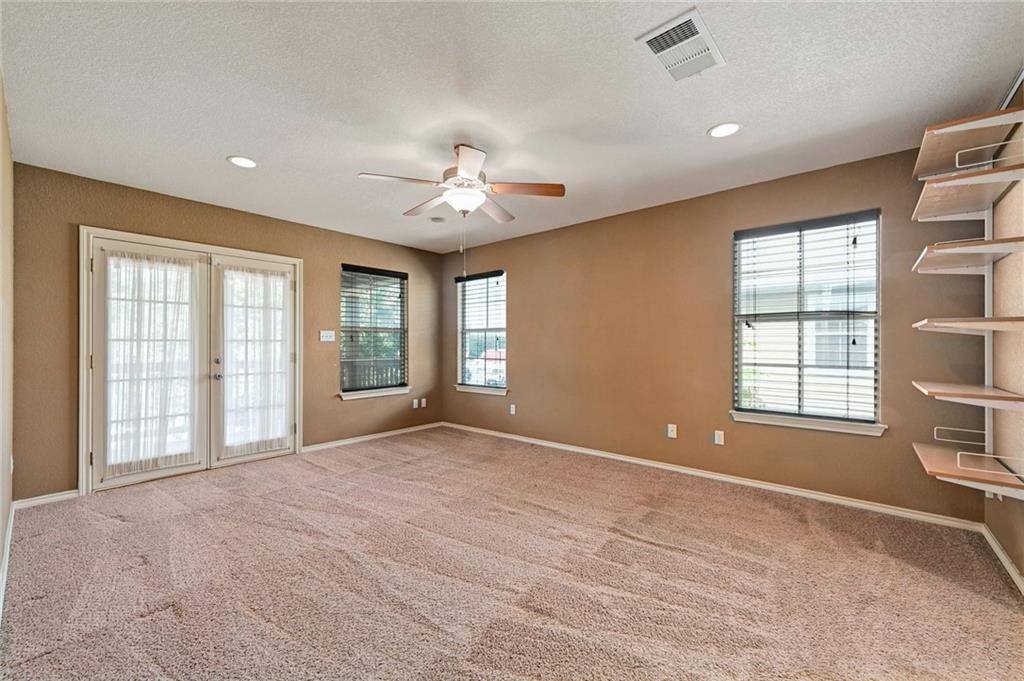 1102 Clermont Avenue Austin, TX 78702 - Photo 4 of 30 a view of an empty room with a window