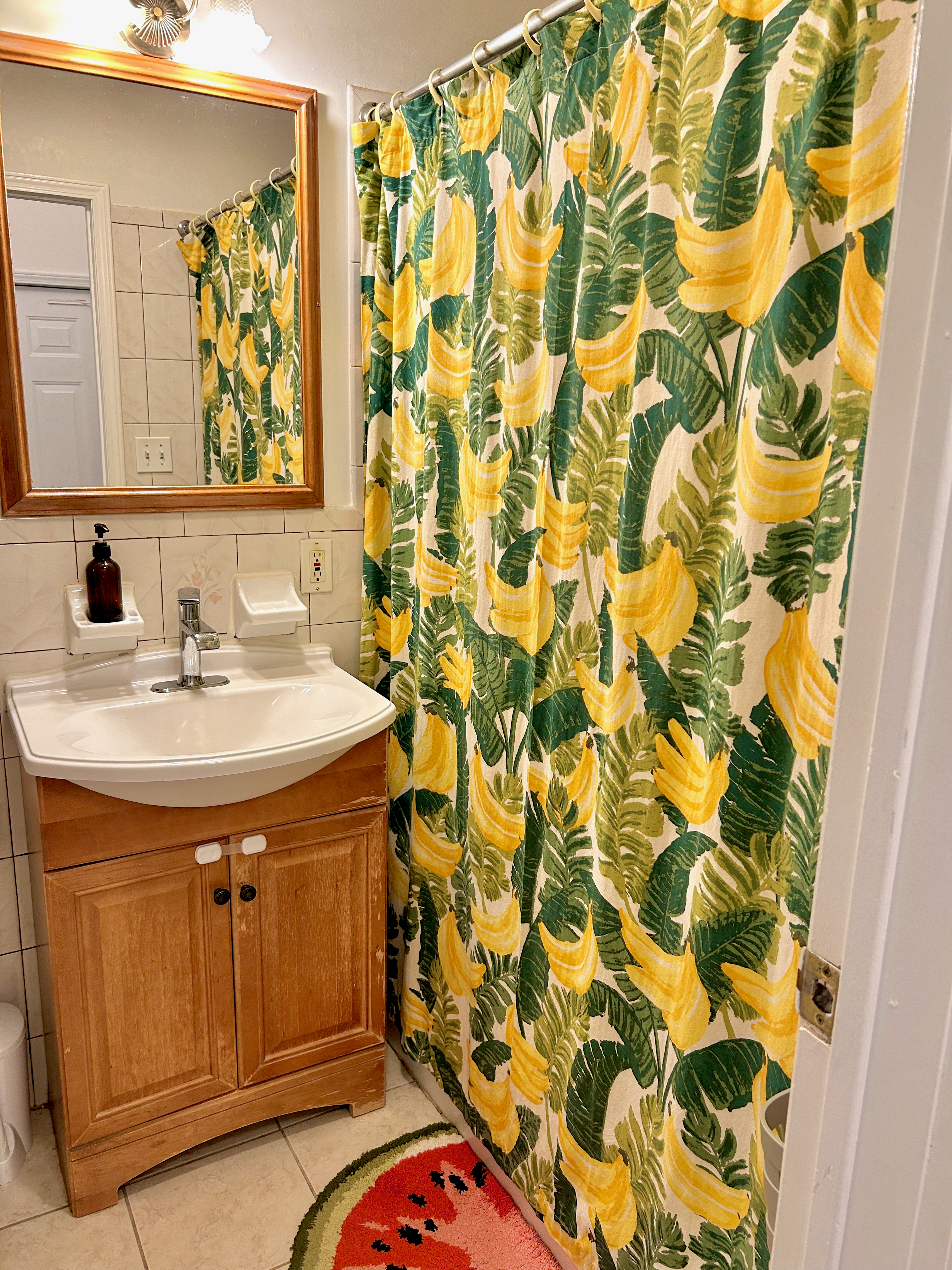 250 19th Street, Unit 2 Brooklyn, NY 11215 - Photo 10 of 18 a bathroom with a sink and a mirror