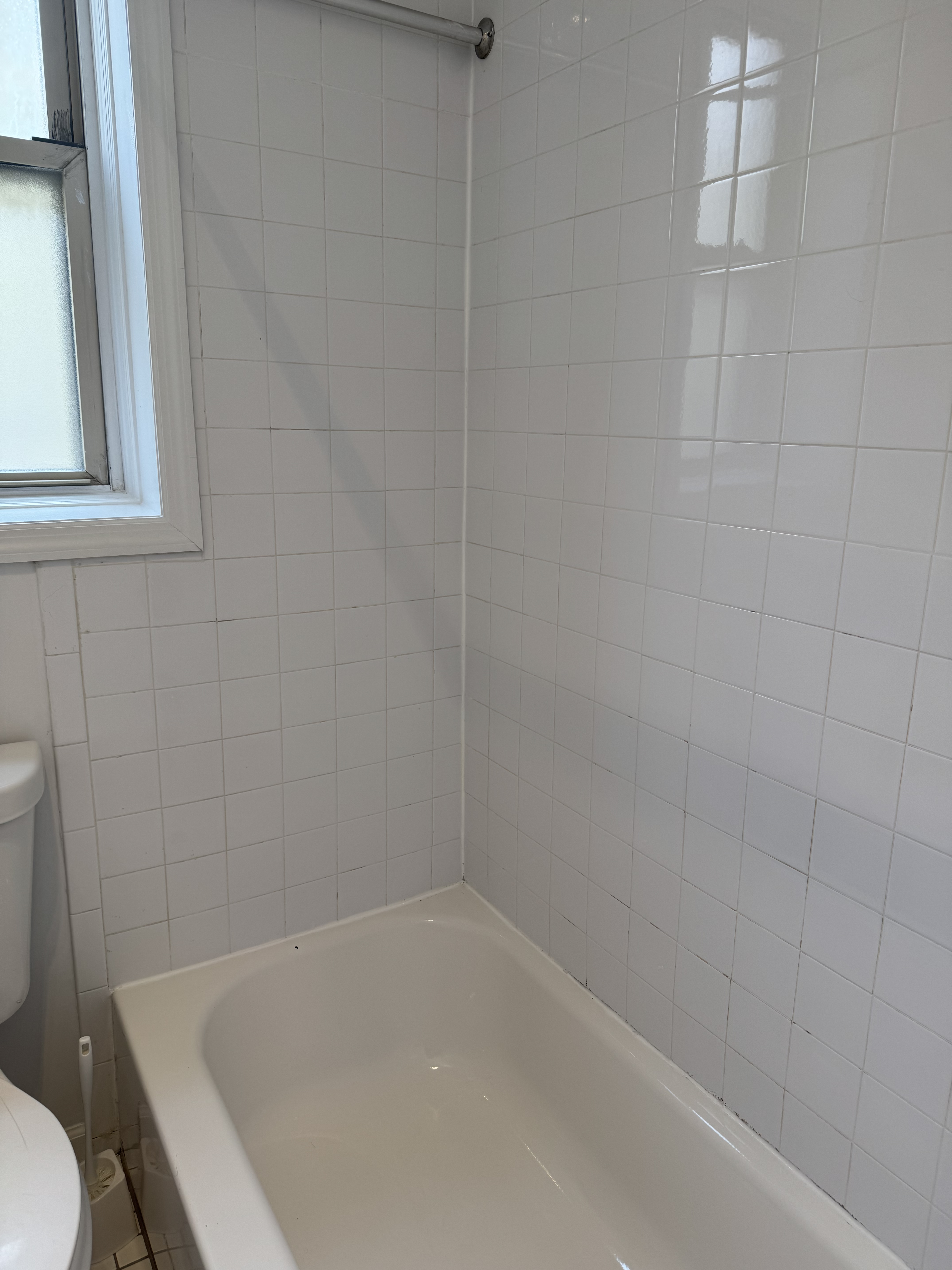 260 Cumberland Street, Unit 15 Brooklyn, NY 11205 - Photo 8 of 10 a white bath tub sitting next to a toilet