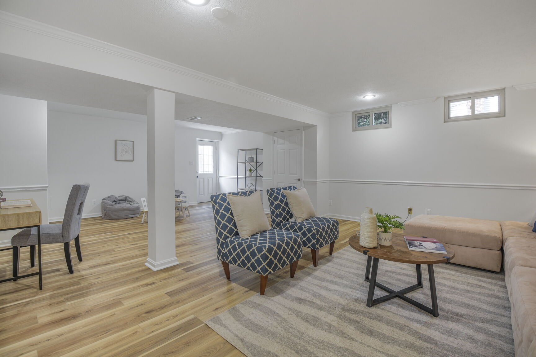 4008 Evangeline Terrace Olney, MD 20832 - Photo 42 of 54 a living room with furniture a wooden floor and a rug