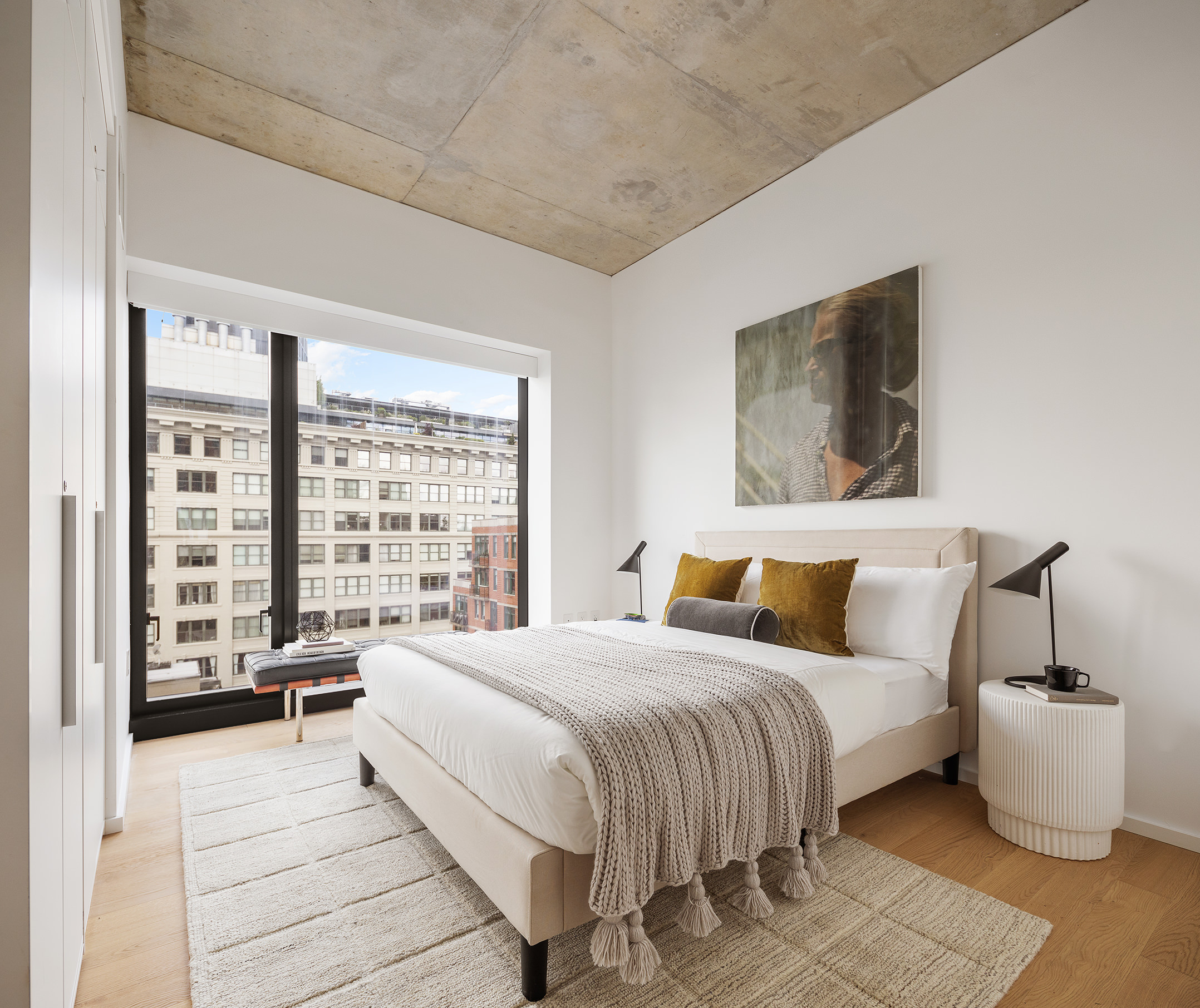 98 Front Street, Unit PH3G Brooklyn, NY 11201 - Photo 5 of 12 a bedroom with a large bed and a window