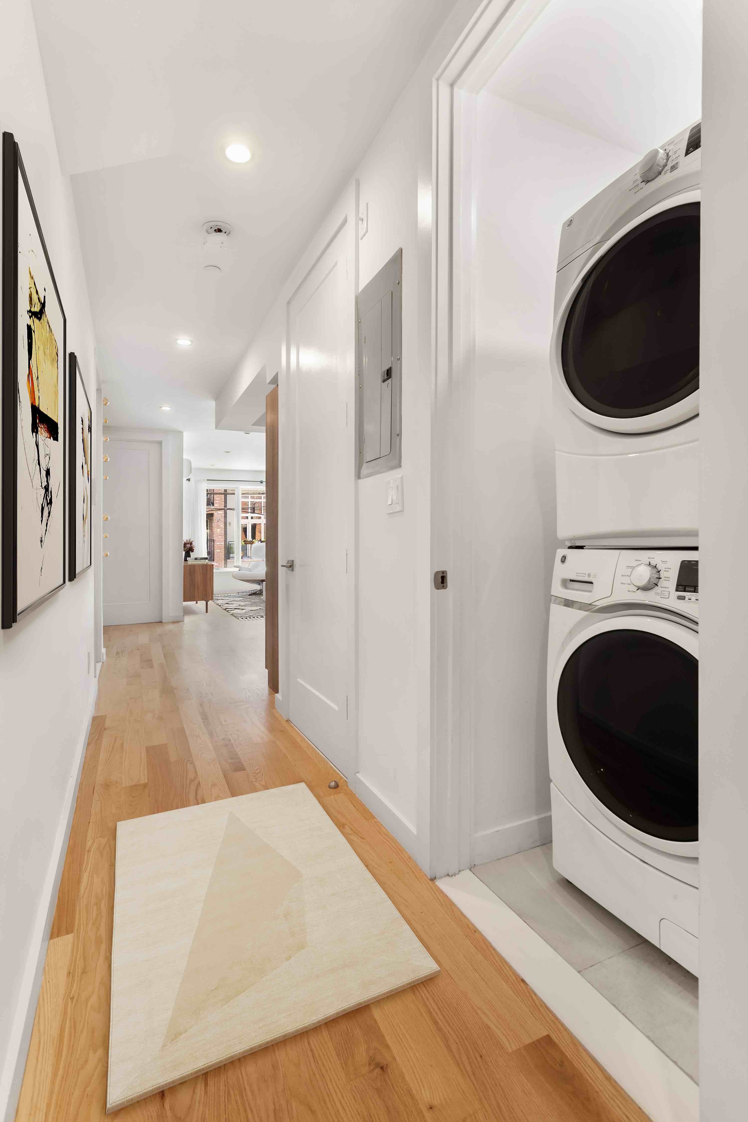 320 Humboldt Street, Unit 2 Brooklyn, NY 11211 - Photo 9 of 10 a view of a kitchen with a sink washer and dryer
