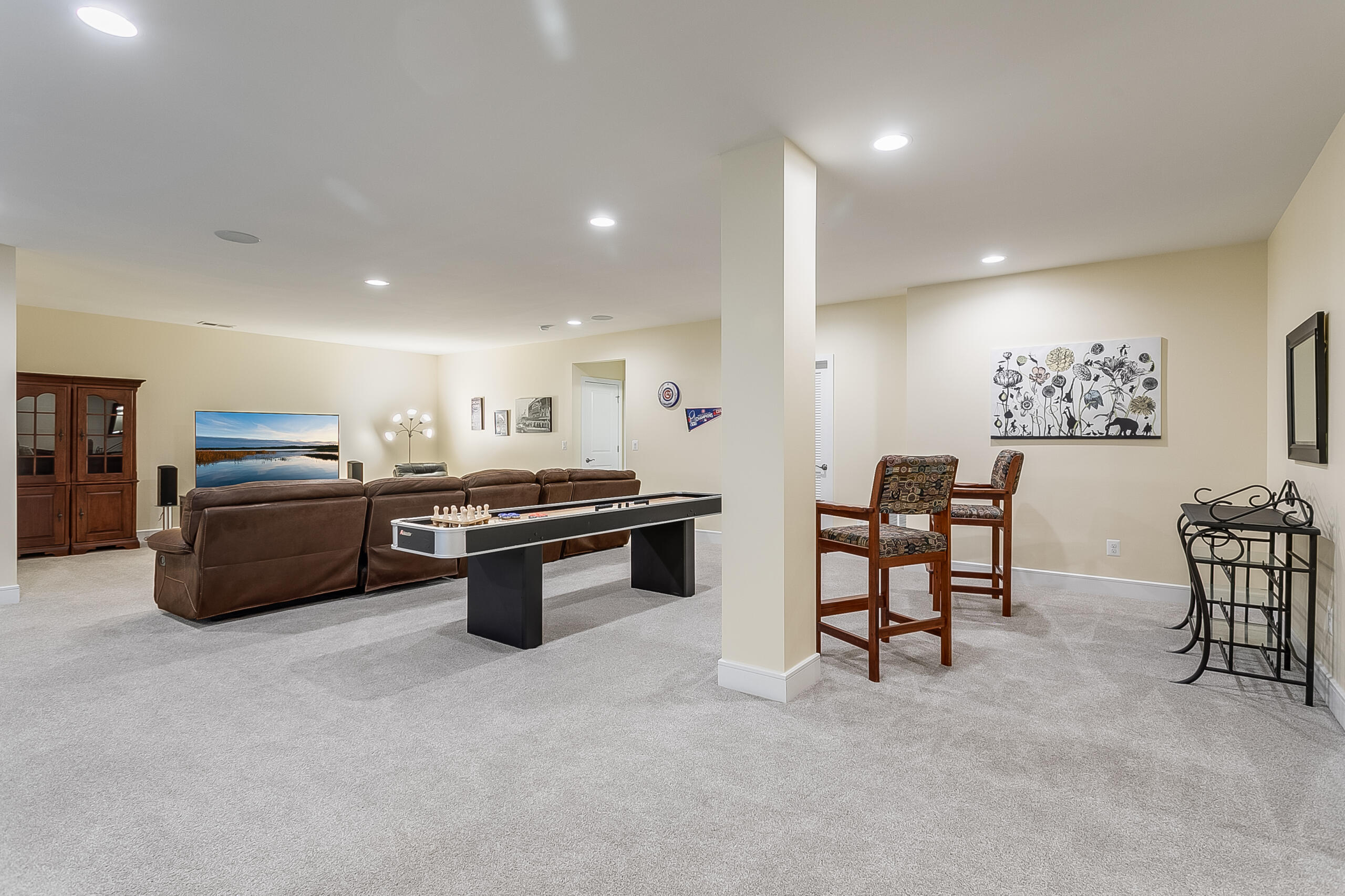 1011 Justinian Street Leesburg, VA 20175 - Photo 42 of 56 a kitchen with stainless steel appliances a sink a counter top space cabinets and furniture