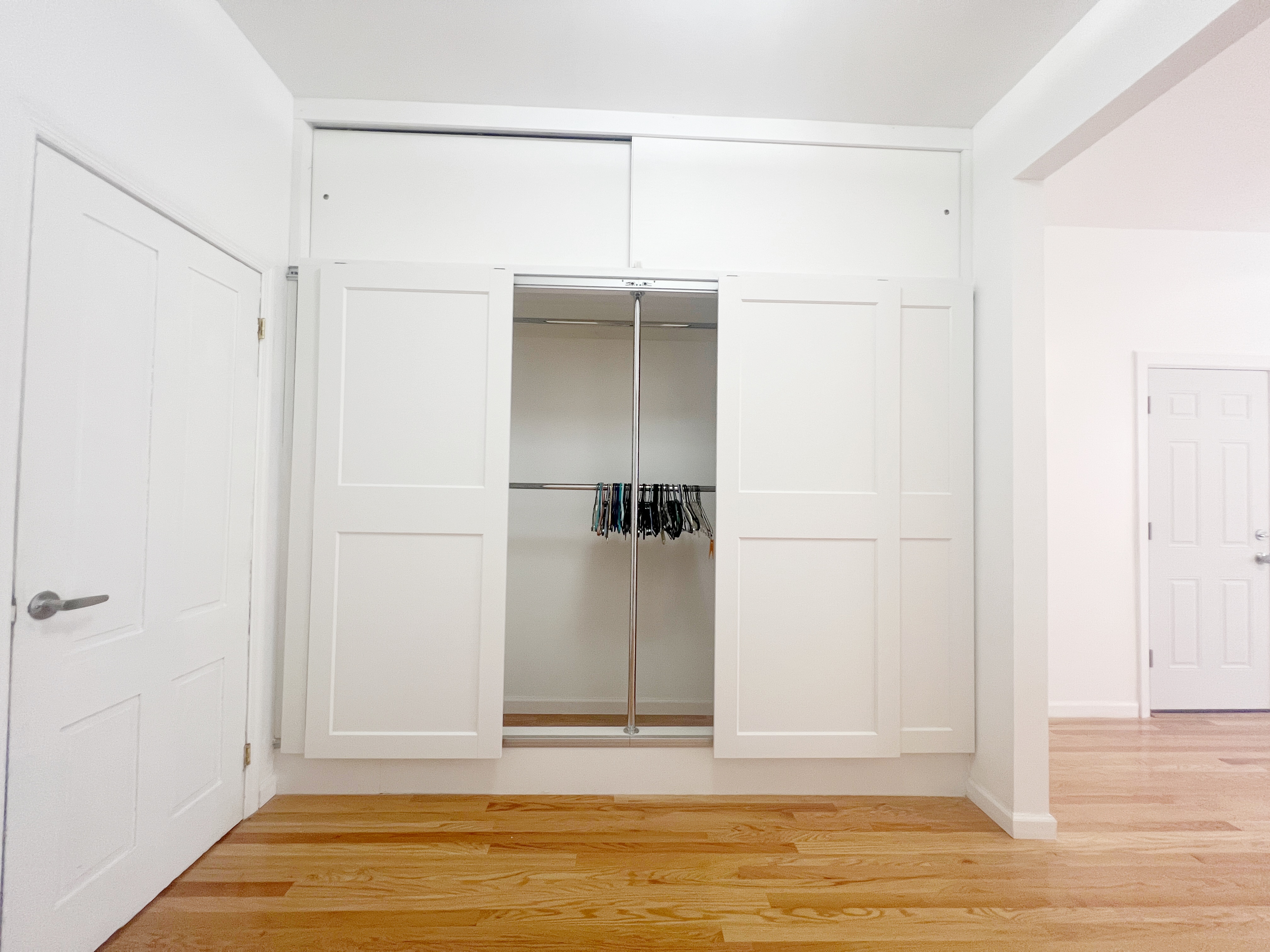 17-22 Menahan Street, Unit 1 Queens, NY 11385 - Photo 5 of 9 a view of walk in closet with empty room
