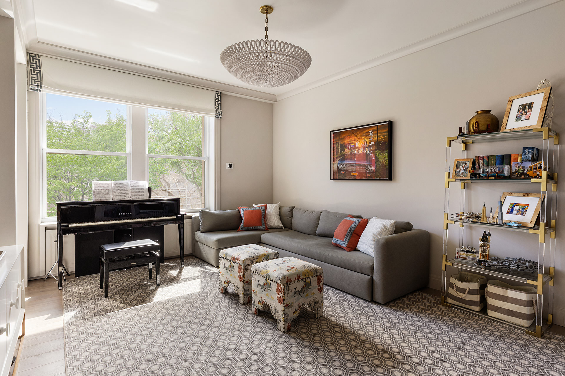 100 West 80th Street, Unit 5B Manhattan, NY 10024 - Photo 9 of 19 a living room with furniture a rug and a large window