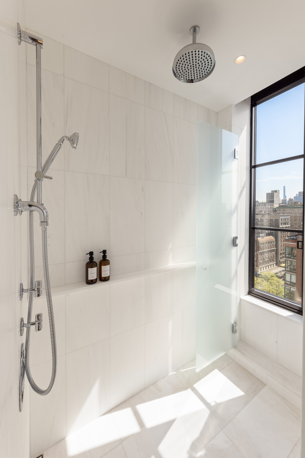 250 West 96th Street, Unit 19D Manhattan, NY 10025 - Photo 11 of 34 a bathroom with a shower
