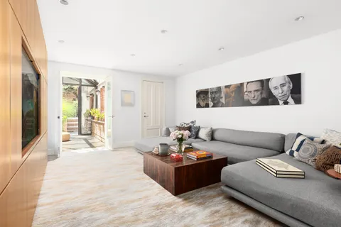 a living room with furniture and a couch