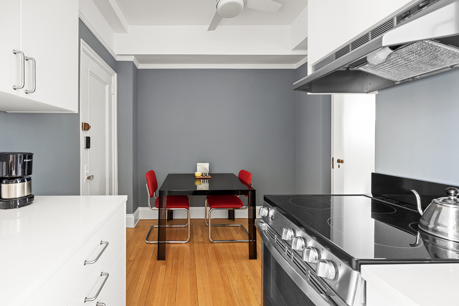 39 Plaza Street West, Unit 12B Brooklyn, NY 11217 - Photo 5 of 12 a bedroom with a bed and a chandelier