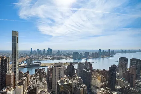 a view of a city with tall buildings