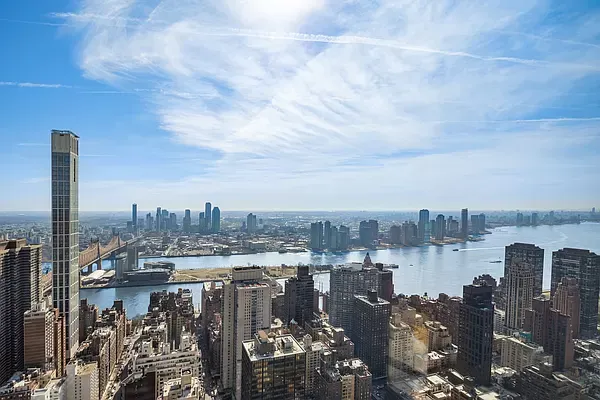 a view of a city with tall buildings