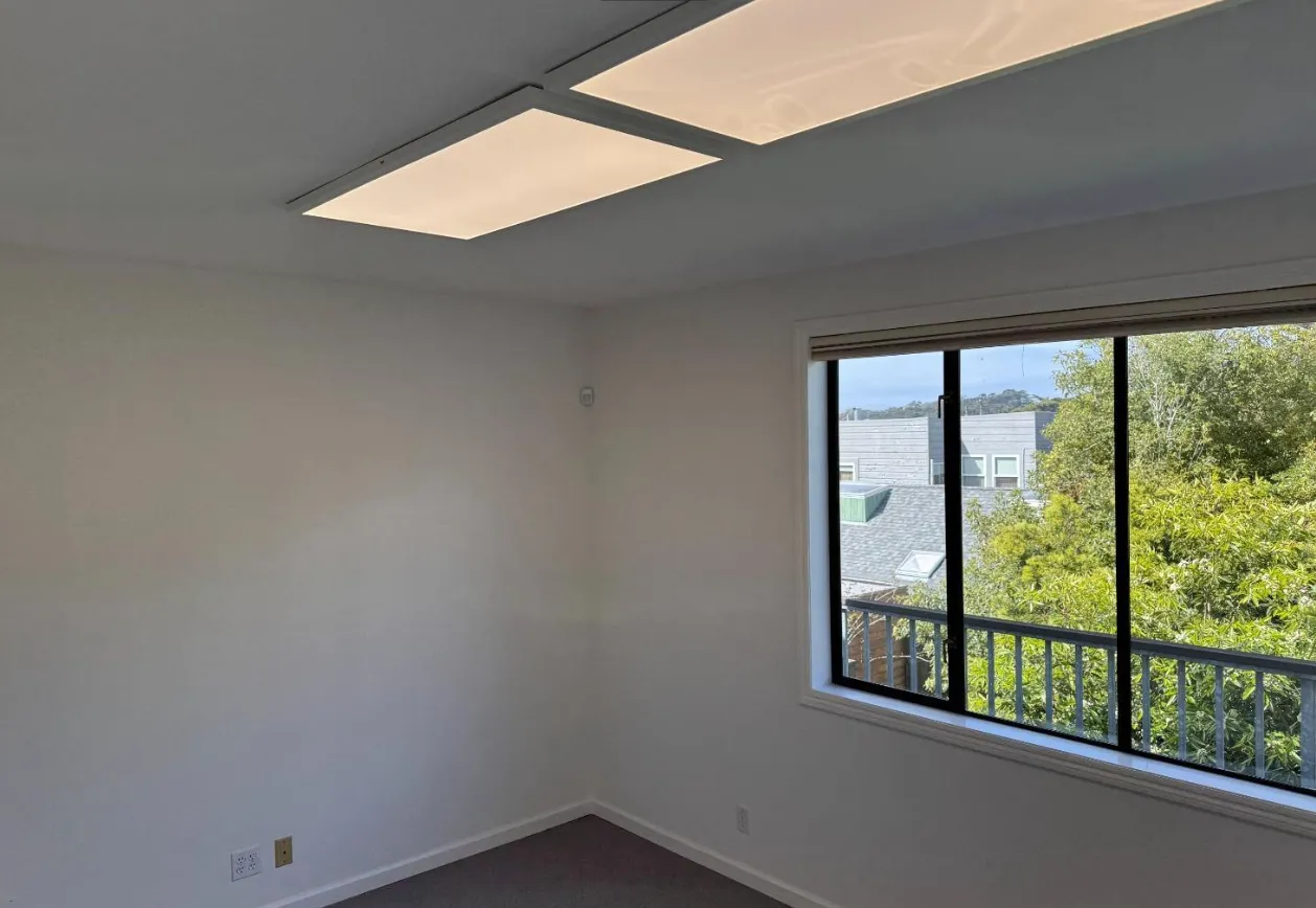 a view of a big room with a fireplace