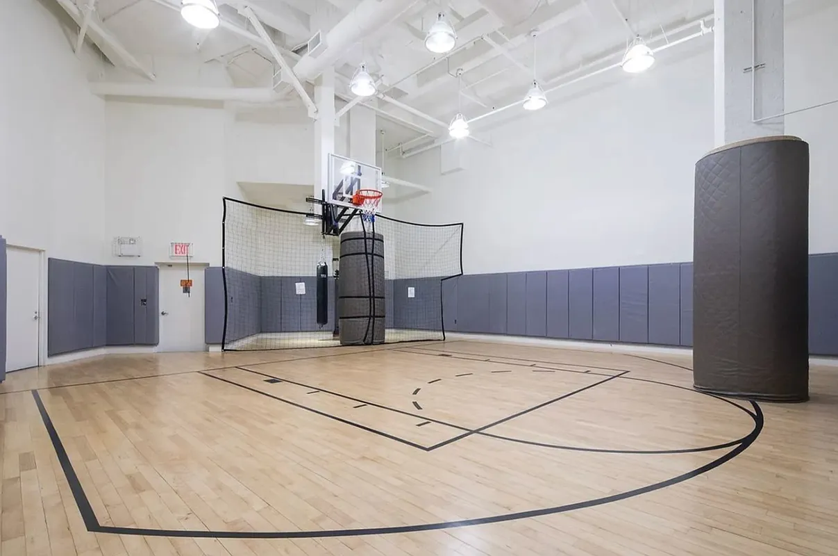 15 Broad Street, Unit 1601 Manhattan, NY 10005 - Photo 9 of 16 a view of a room with gym equipment