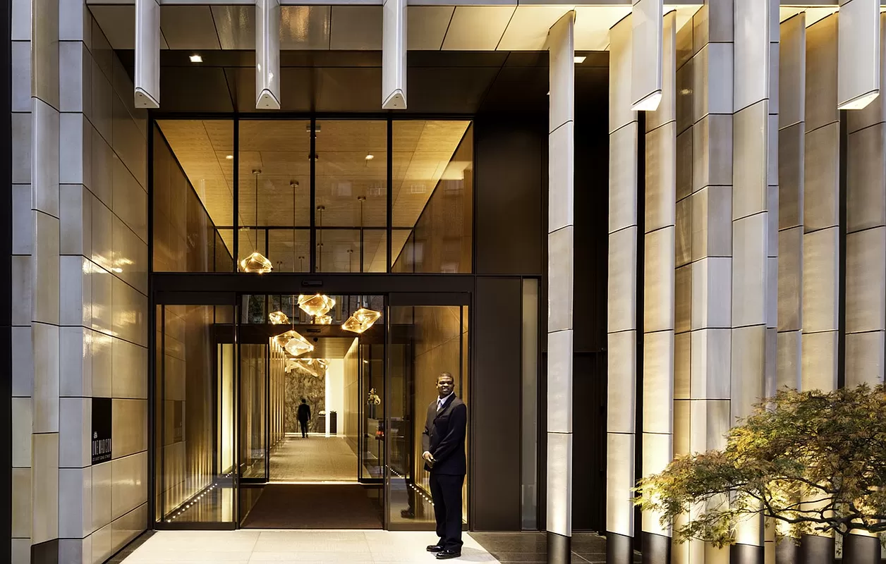 23 East 22nd Street, Unit 8A Manhattan, NY 10010 - Photo 19 of 25 a view of a building with a glass door