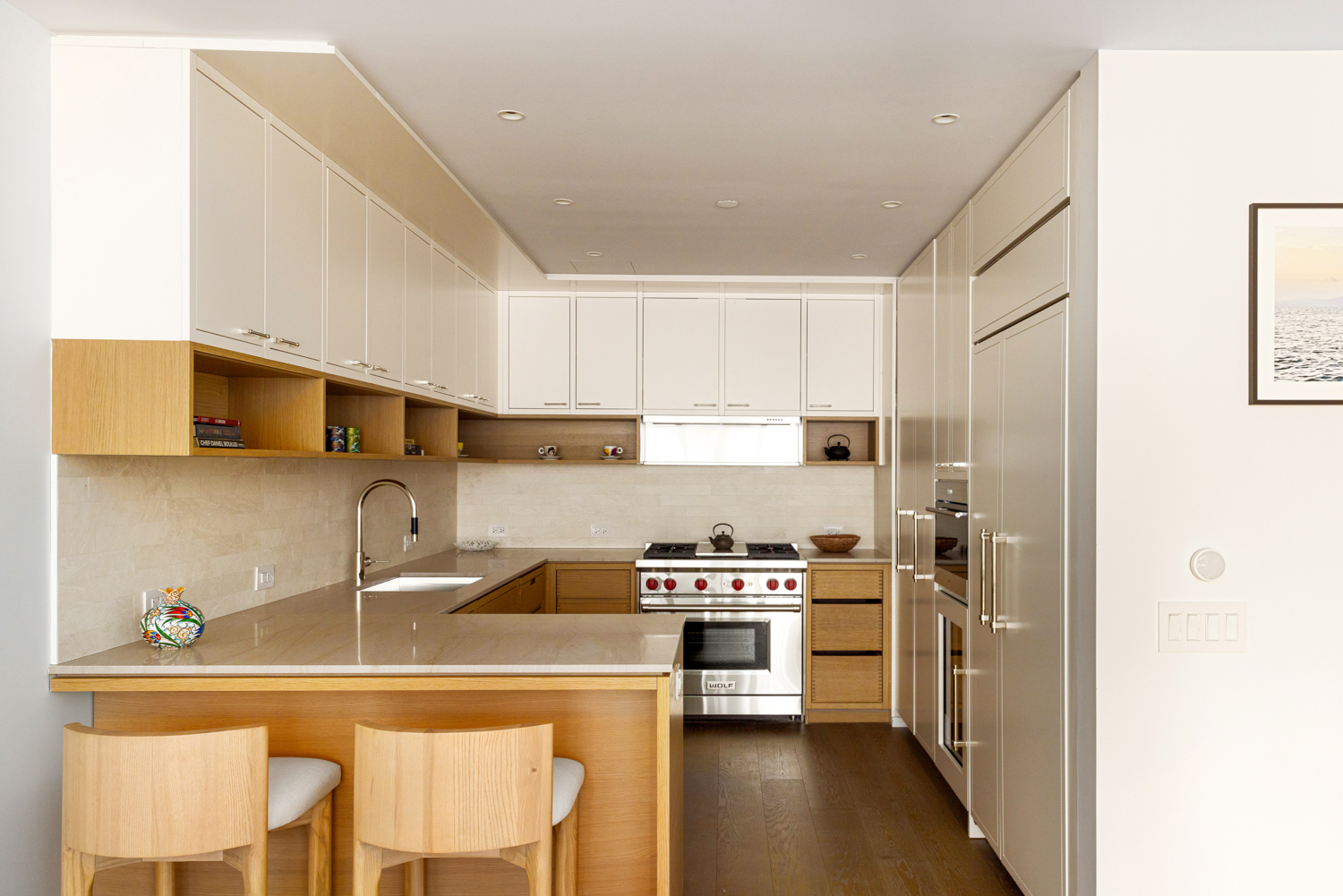 250 West 96th Street, Unit 14B Manhattan, NY 10025 - Photo 3 of 26 a kitchen with stainless steel appliances wooden cabinets and a refrigerator