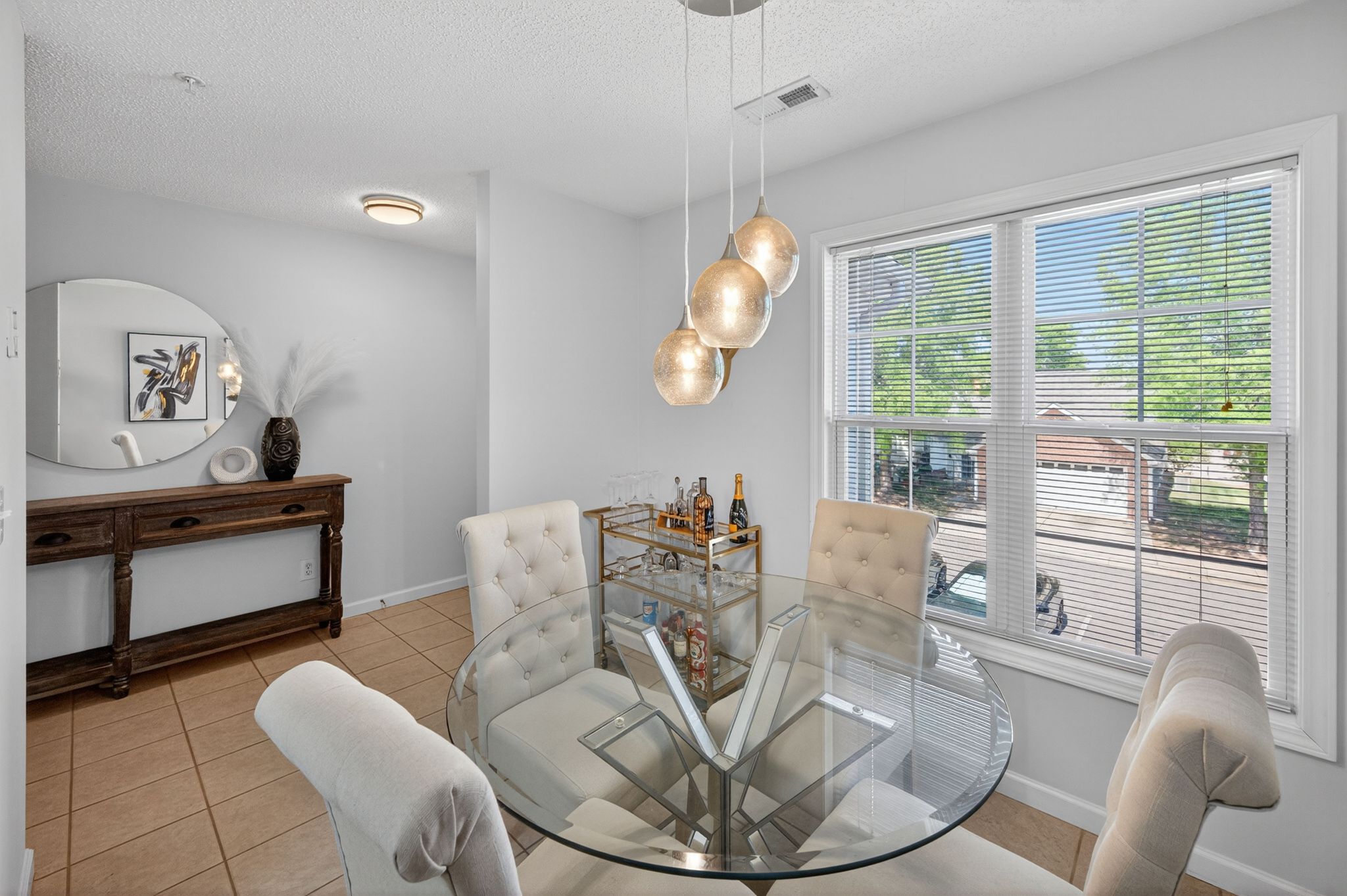 Huntscroft Lane Raleigh, NC 27617 - Photo 33 of 49 a living room with furniture and a large window