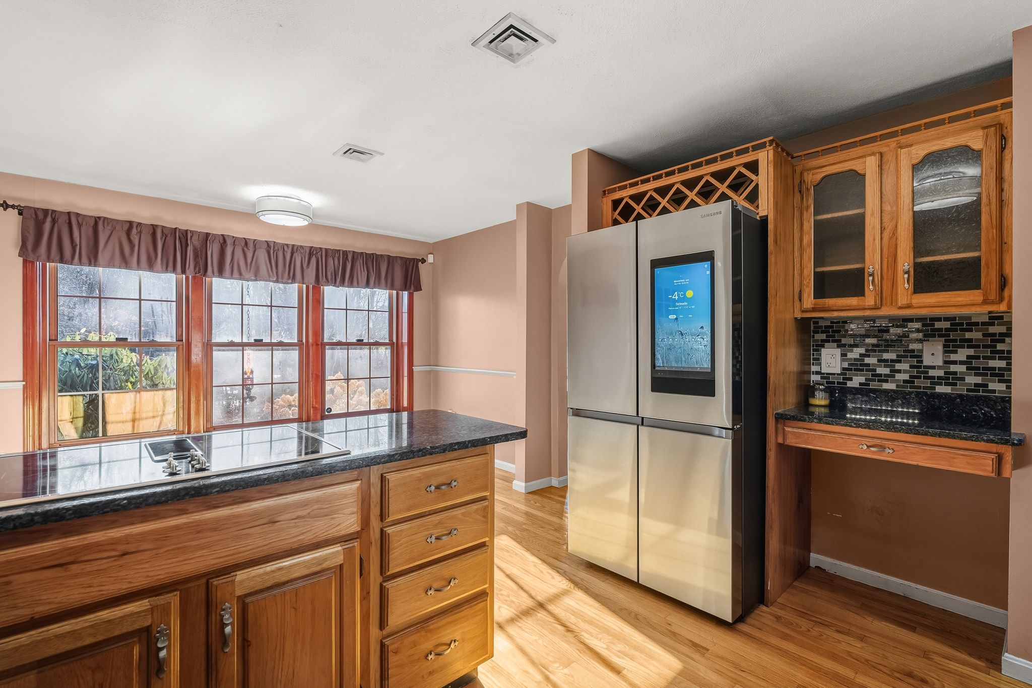 129 H J Albee Drive Braintree, MA 02184 - Photo 5 of 36 a kitchen with stainless steel appliances granite countertop a refrigerator and a sink