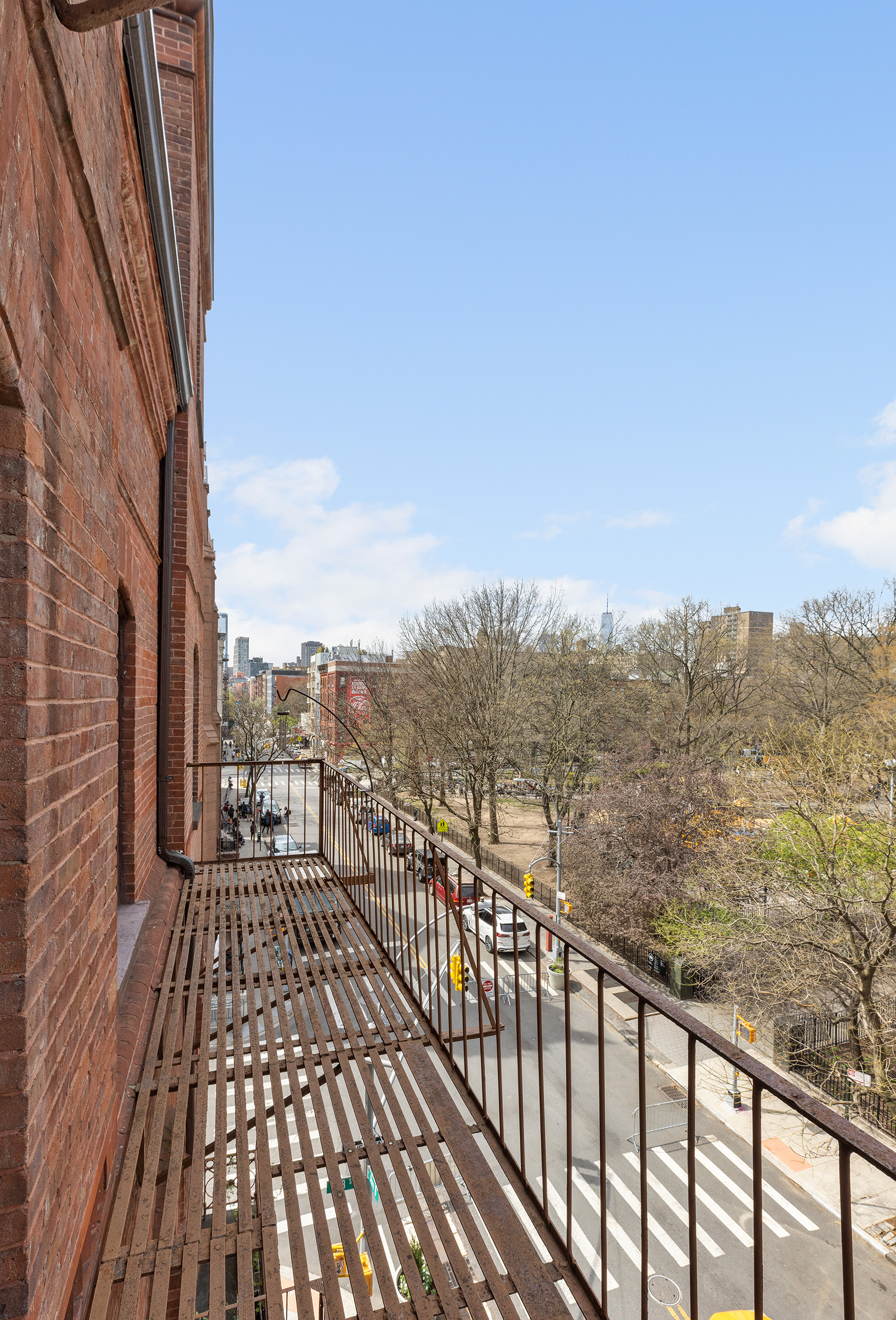 295 East 8th Street, Unit 3W Manhattan, NY 10009 - Photo 10 of 18 a view of a balcony with city view