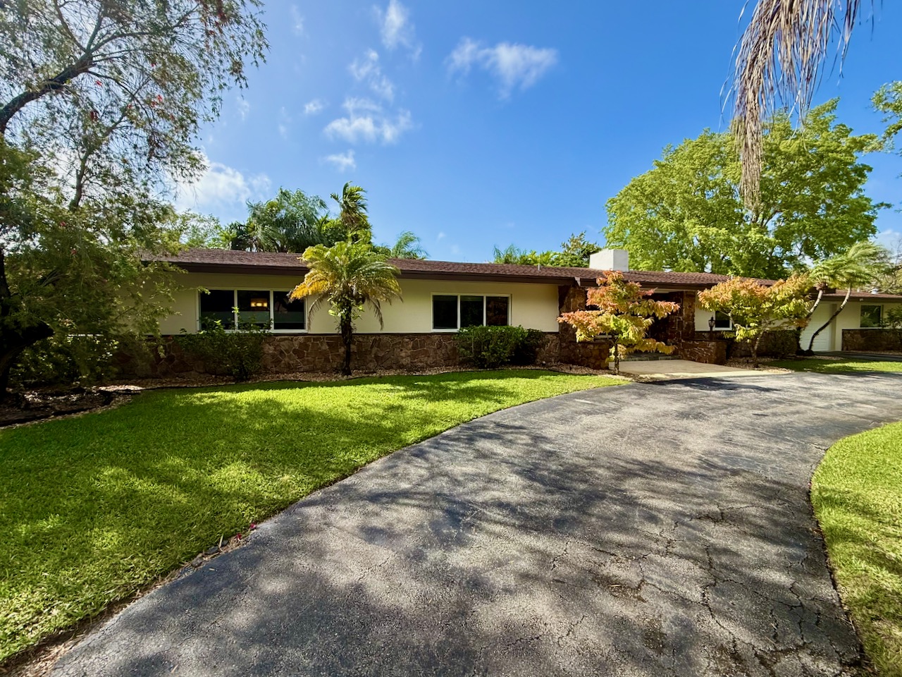 7555 Southwest 79th Avenue Miami, FL 33143 - Photo 2 of 8 a view of house with swimming pool outdoor seating