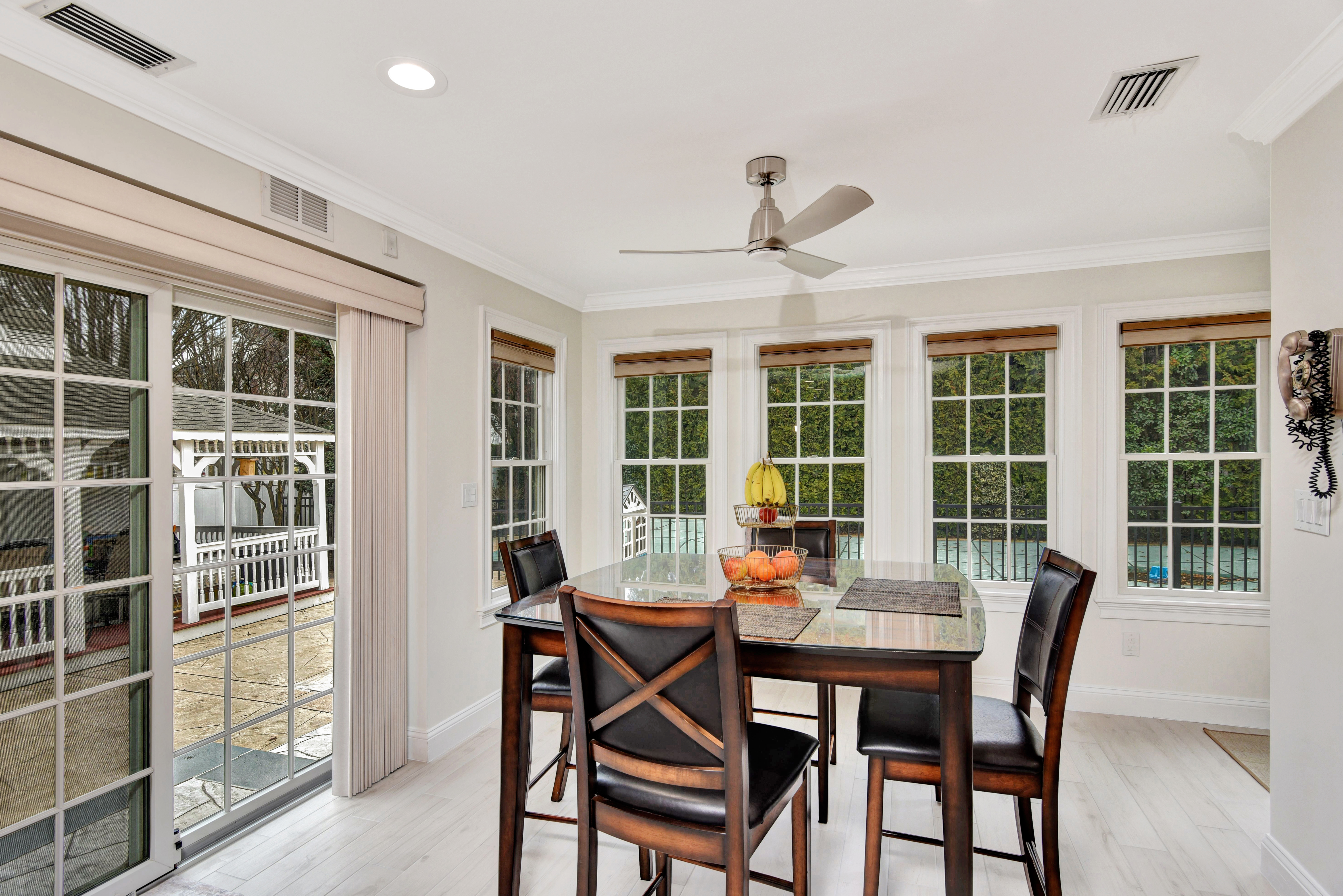 215 Lawrence Avenue Staten Island, NY 10310 - Photo 11 of 45 a view of a dining room with furniture window and outside view