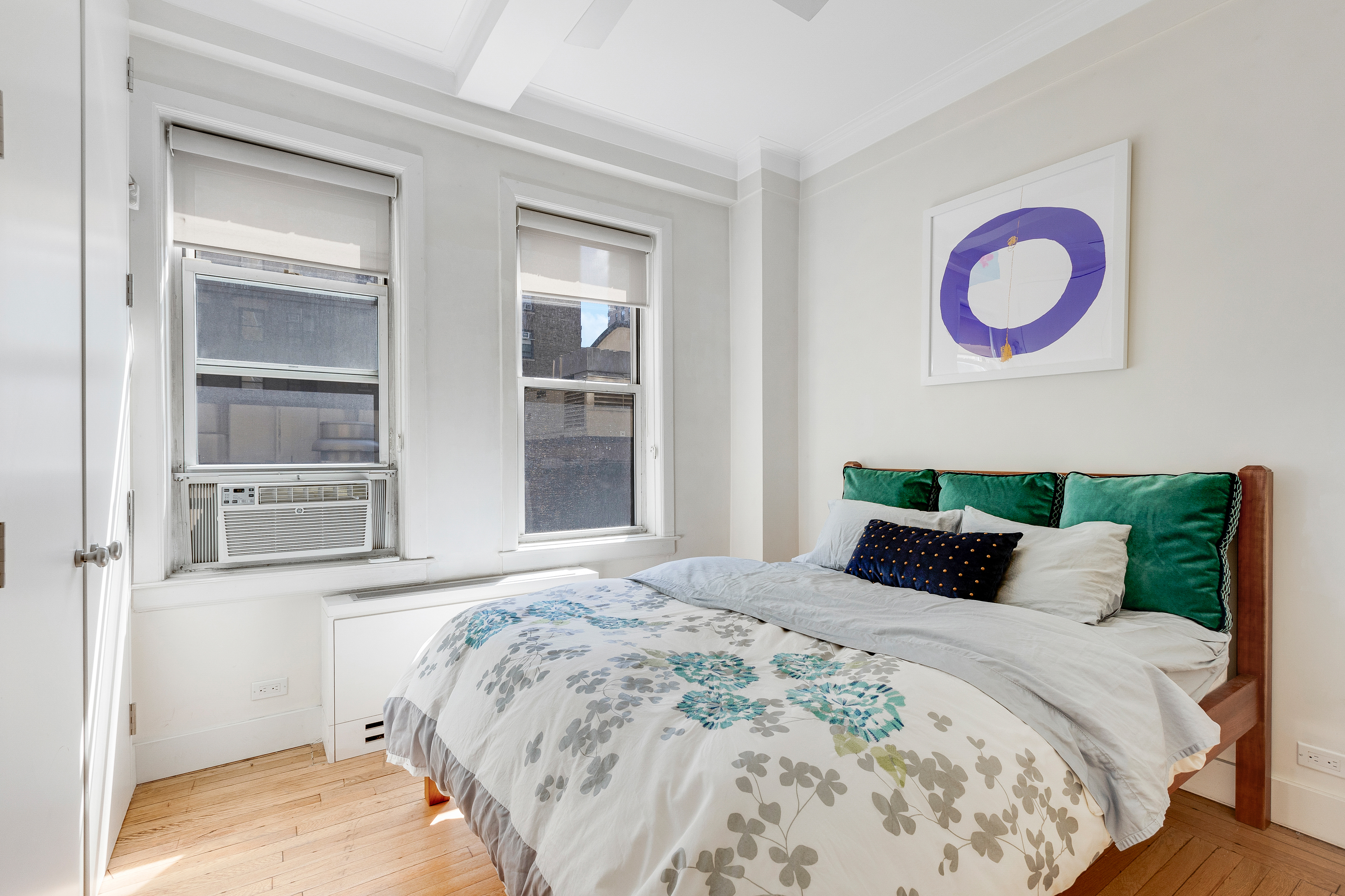 588 West End Avenue, Unit 6D Manhattan, NY 10024 - Photo 7 of 9 a bedroom with a bed and a window