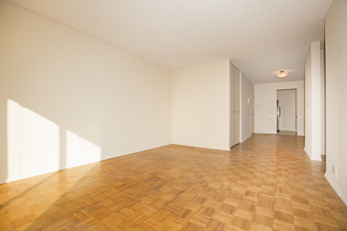 445 5th Avenue, Unit 23D Manhattan, NY 10016 - Photo 2 of 15 a view of an empty room