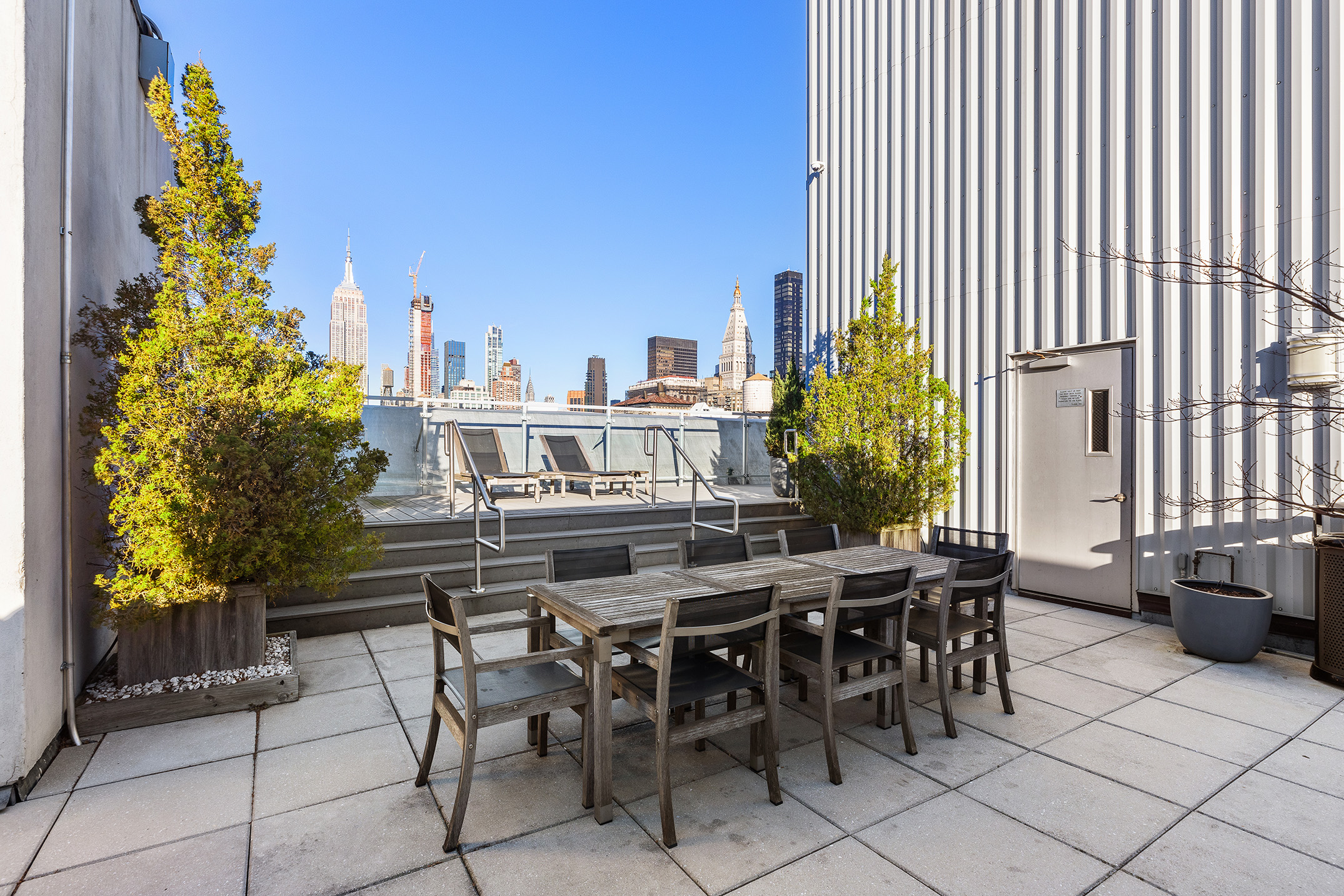 32 West 18th Street, Unit 7B Manhattan, NY 10011 - Photo 13 of 19 a view of a dinning tables and chairs in patio