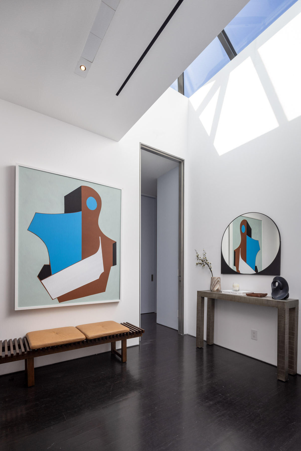 92 Laight Street, Unit PHC Manhattan, NY 10013 - Photo 14 of 16 a room with furniture and wooden floor