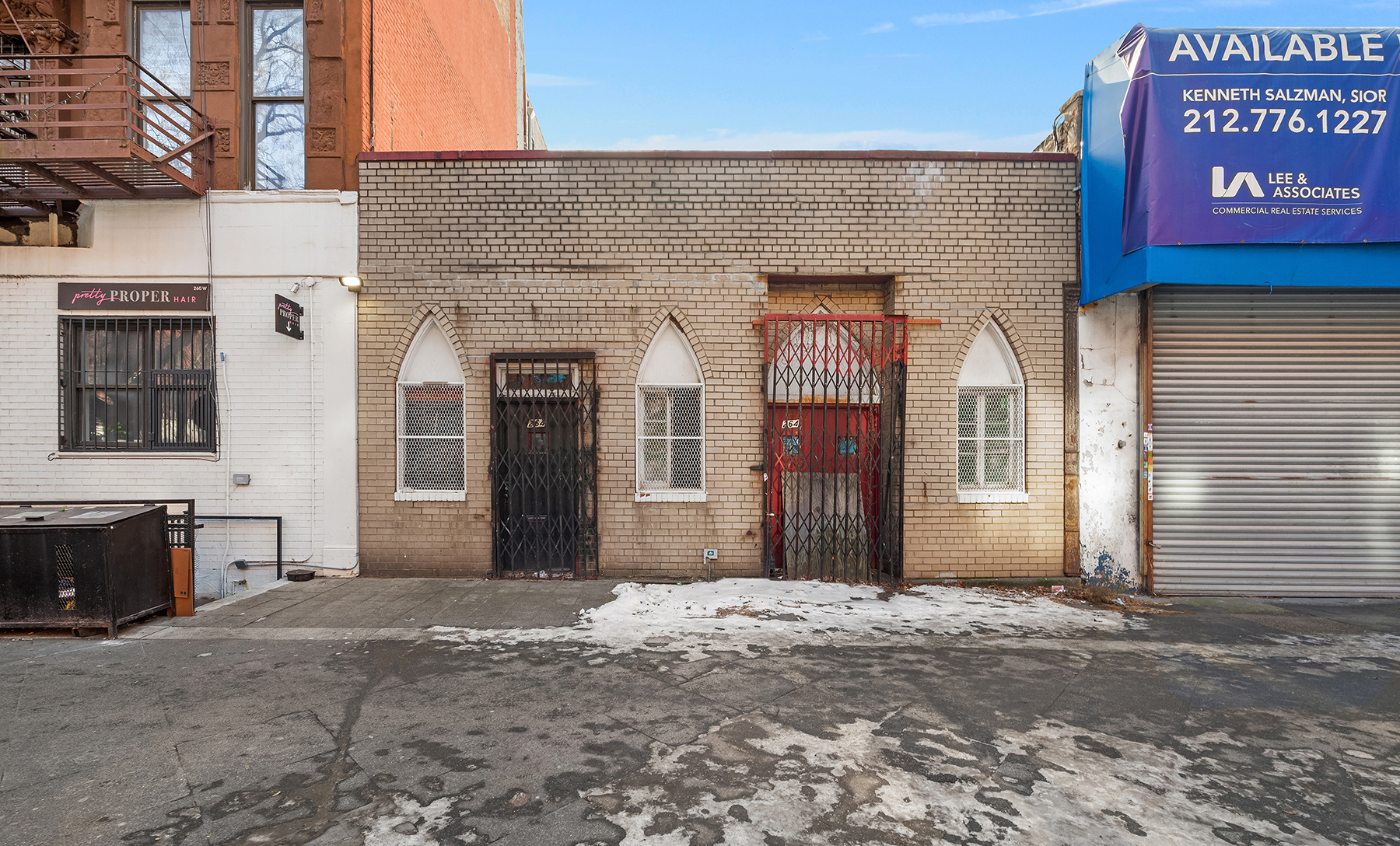 264 West 135th Street Manhattan, NY 10030 - Photo 2 of 4 a front view of a house