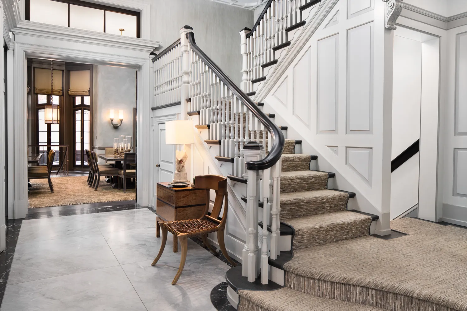 a view of entryway livingroom and hall with wooden floor
