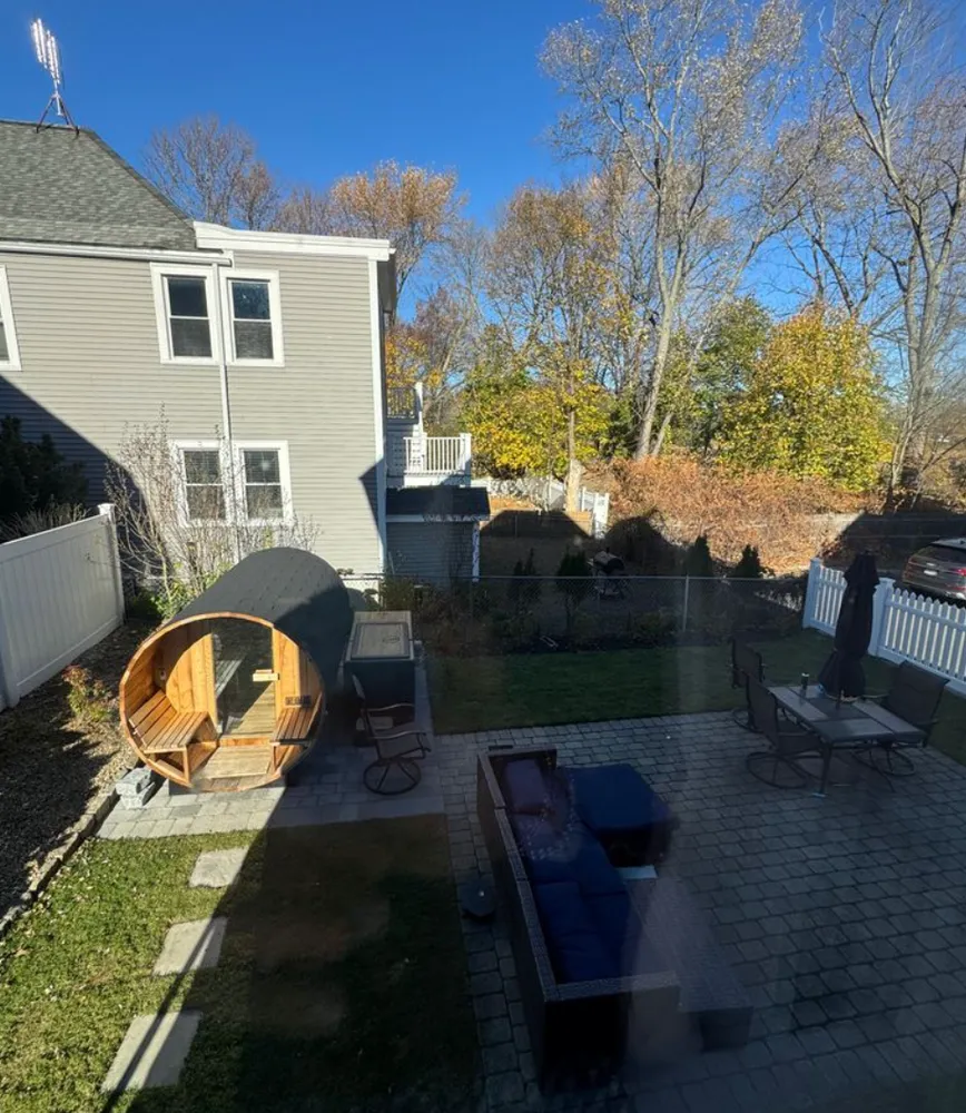 a view of backyard with seating space