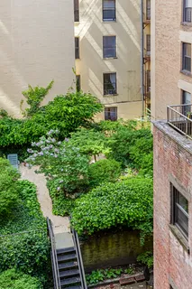 a aerial view of a house with a yard
