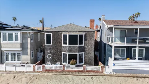 a front view of a house with street