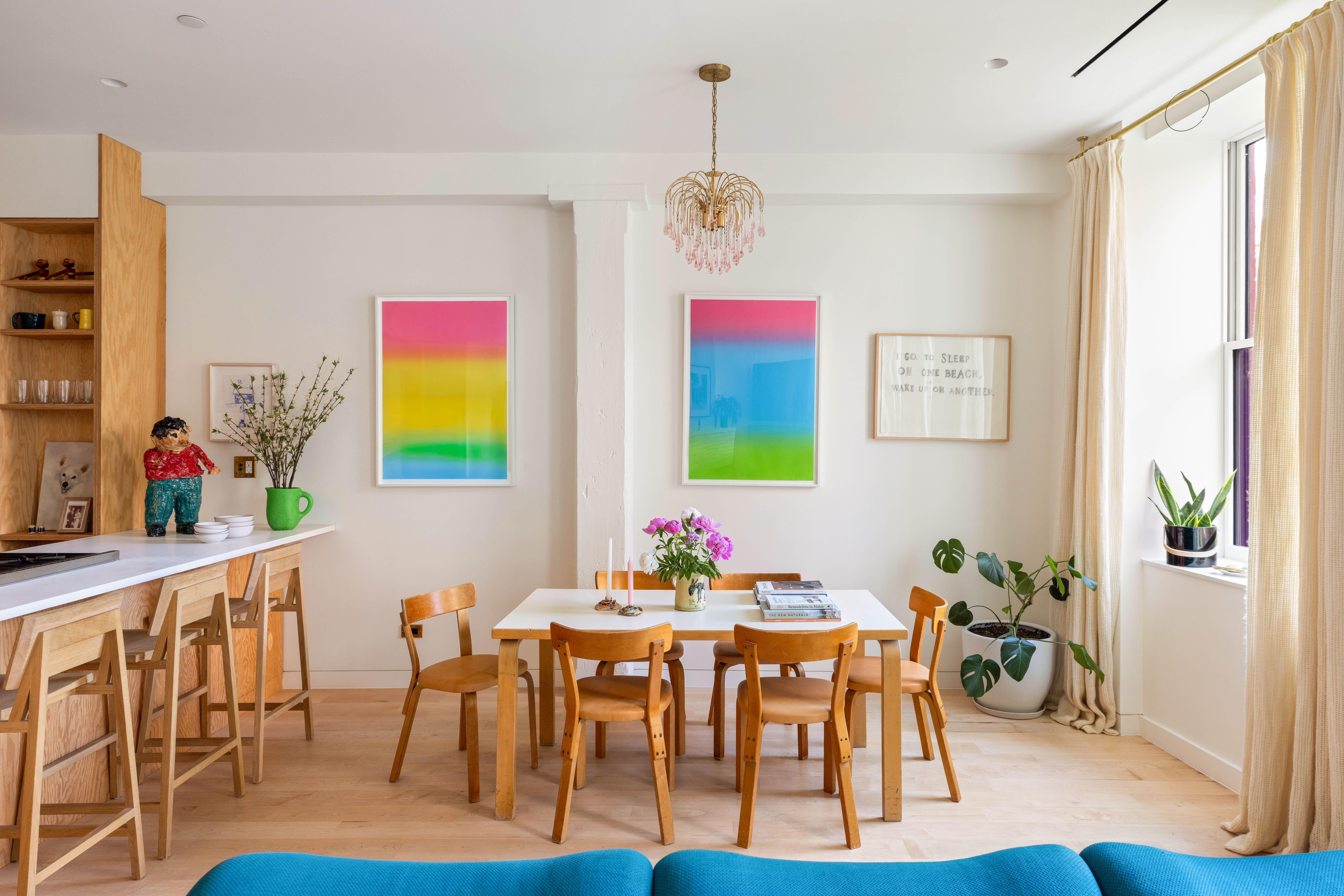 130 Jane Street, Unit 5/6F Manhattan, NY 10014 - Photo 7 of 23 a view of a dining room with furniture and wooden floor