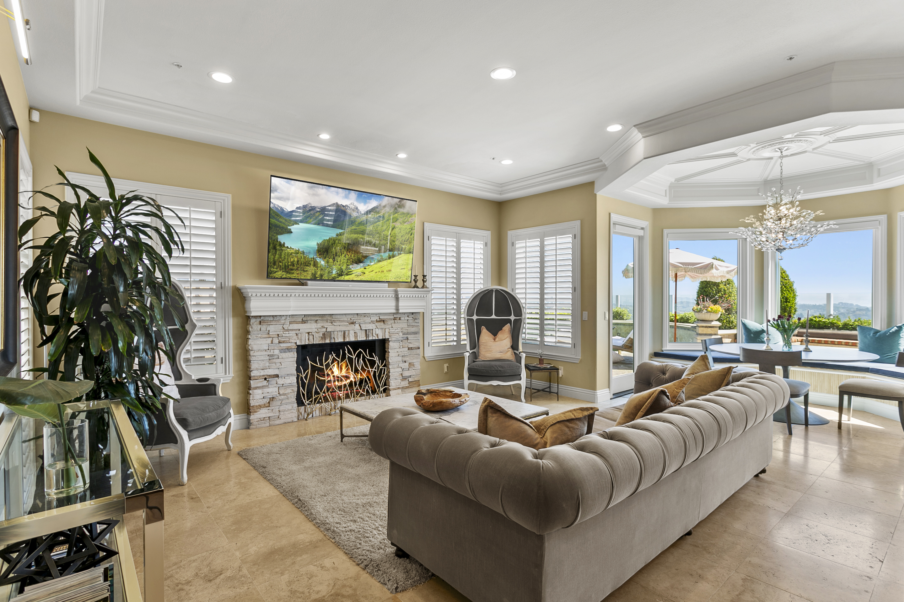 10 Vista Montemar Laguna Niguel, CA 92677 - Photo 20 of 67 a living room with furniture a fireplace and a flat screen tv