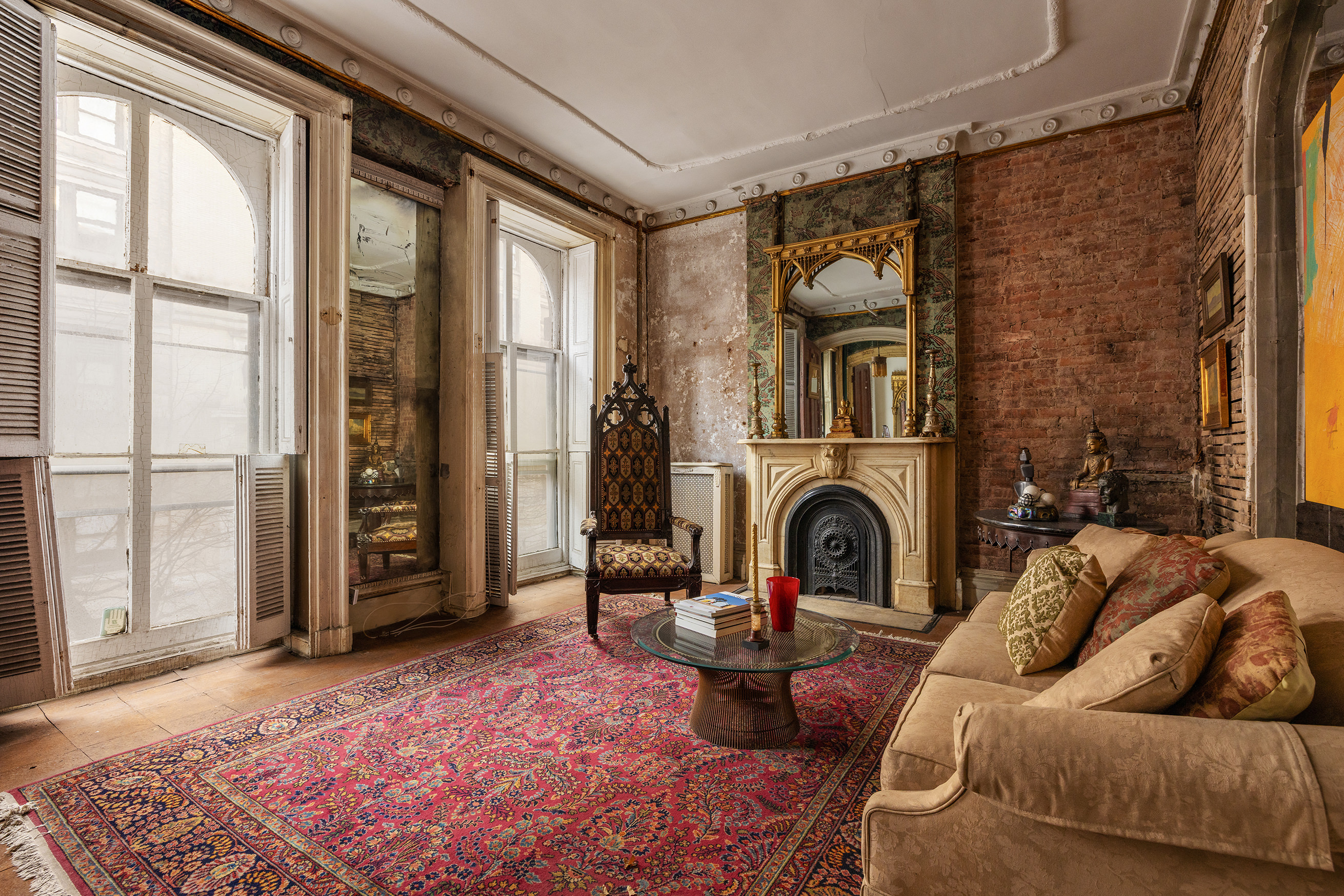 35 Stuyvesant Street Manhattan, NY 10003 - Photo 4 of 11 a living room with furniture windows and a fireplace
