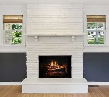 a living room with a fireplace and a fireplace