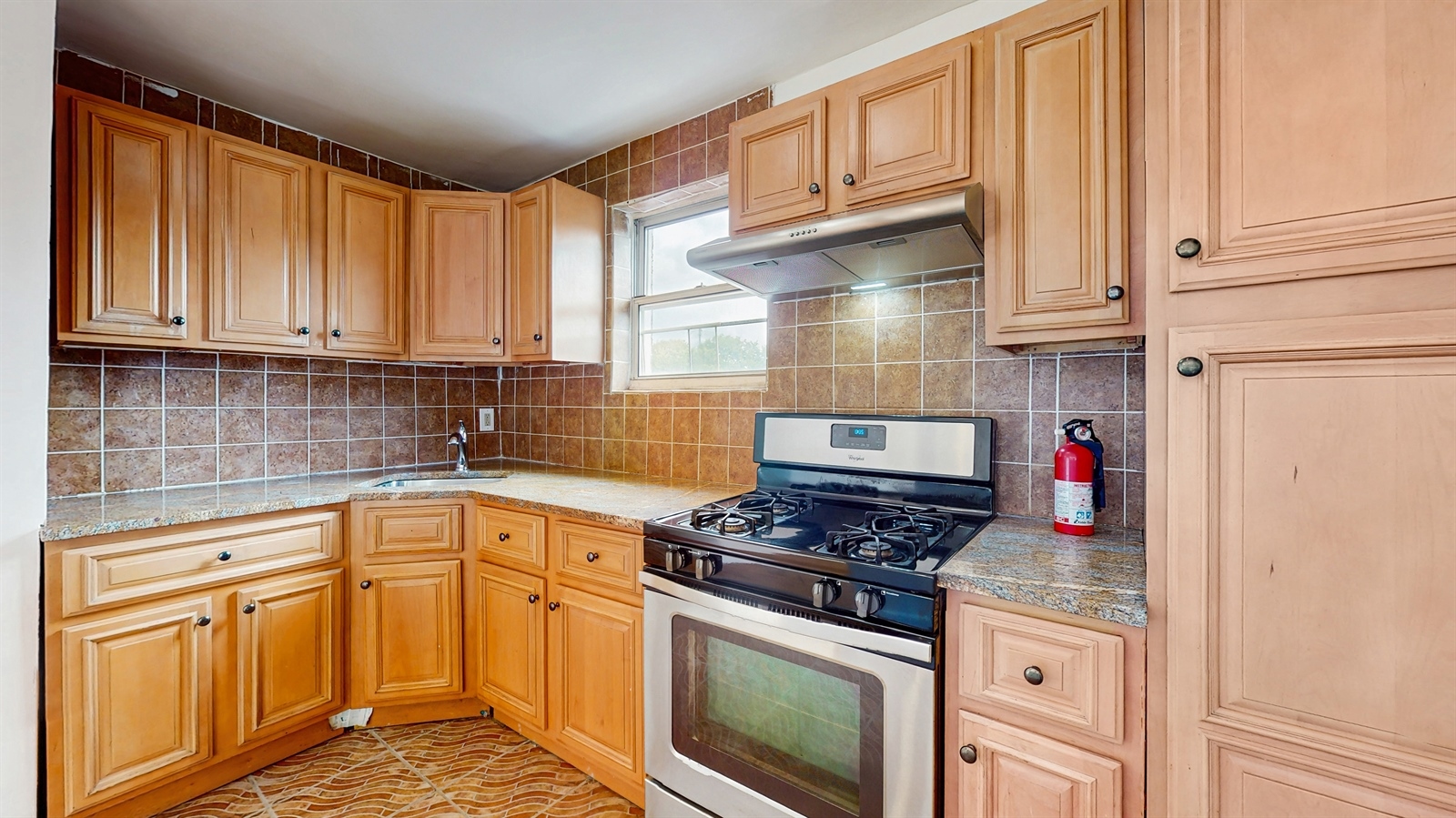 295 Conklin Avenue, Unit 3 Brooklyn, NY 11236 - Photo 2 of 15 a kitchen with stainless steel appliances granite countertop a stove a sink and cabinets